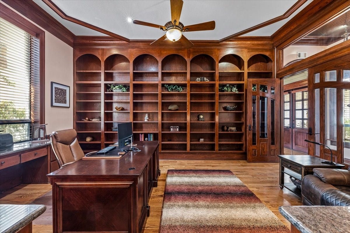 11860 Grand Harbor Boulevard, Montgomery, TX 77356 How about working from home in this office? Doubling as a study with floor to ceiling bookshelves. Opposite side offers functional built in file cabinets and shelving.