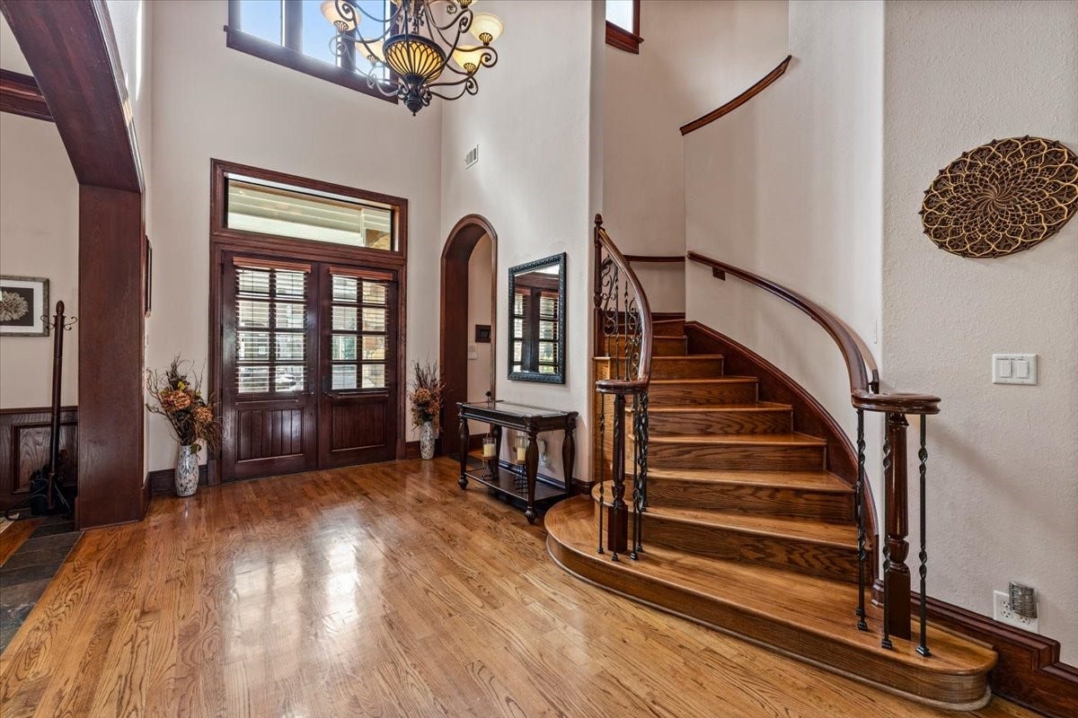 11860 Grand Harbor Boulevard, Montgomery, TX 77356 Sweeping staircase leading up to the gameroom and 2 secondary bedrooms.