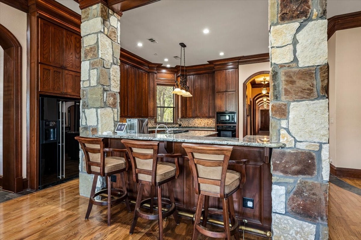 11860 Grand Harbor Boulevard, Montgomery, TX 77356 Additional bar top seating in the kitchen.