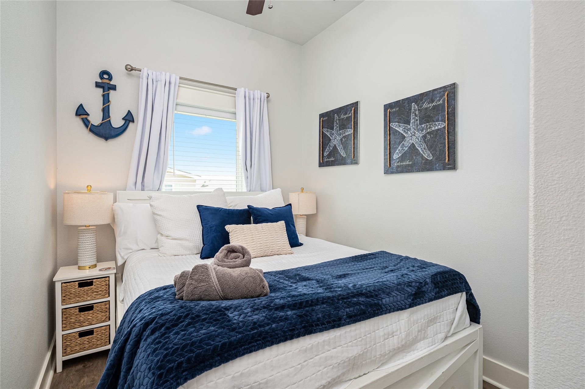 997 S Redfish Street, Crystal Beach, TX 77650 A cozy bedroom gives you a peaceful place to recharge, with natural light and a relaxed coastal feel.