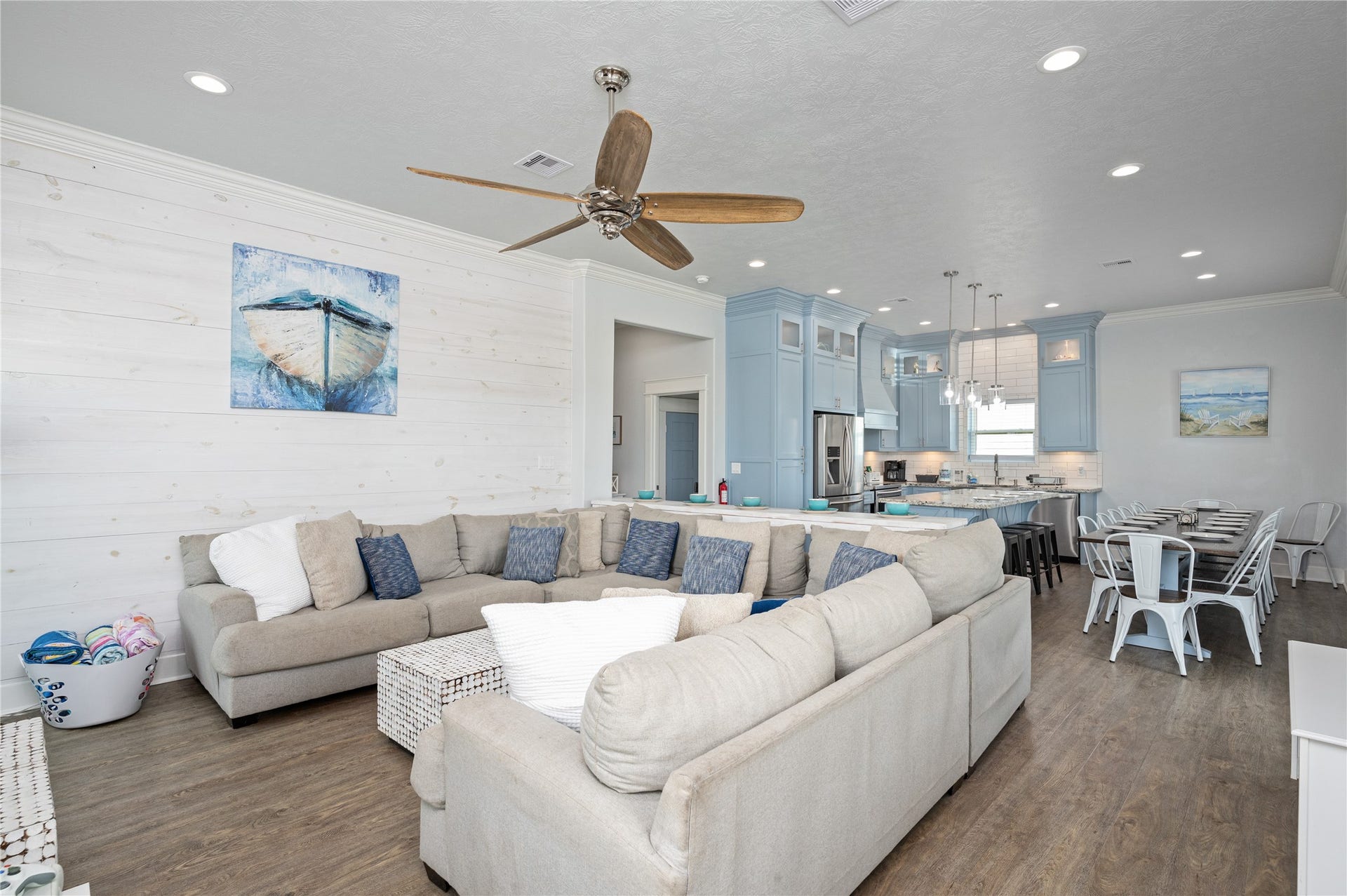 997 S Redfish Street, Crystal Beach, TX 77650 Everyone has room to come together in your bright, open living space, where the kitchen, dining area, and oversized sectional keep the whole crew connected.