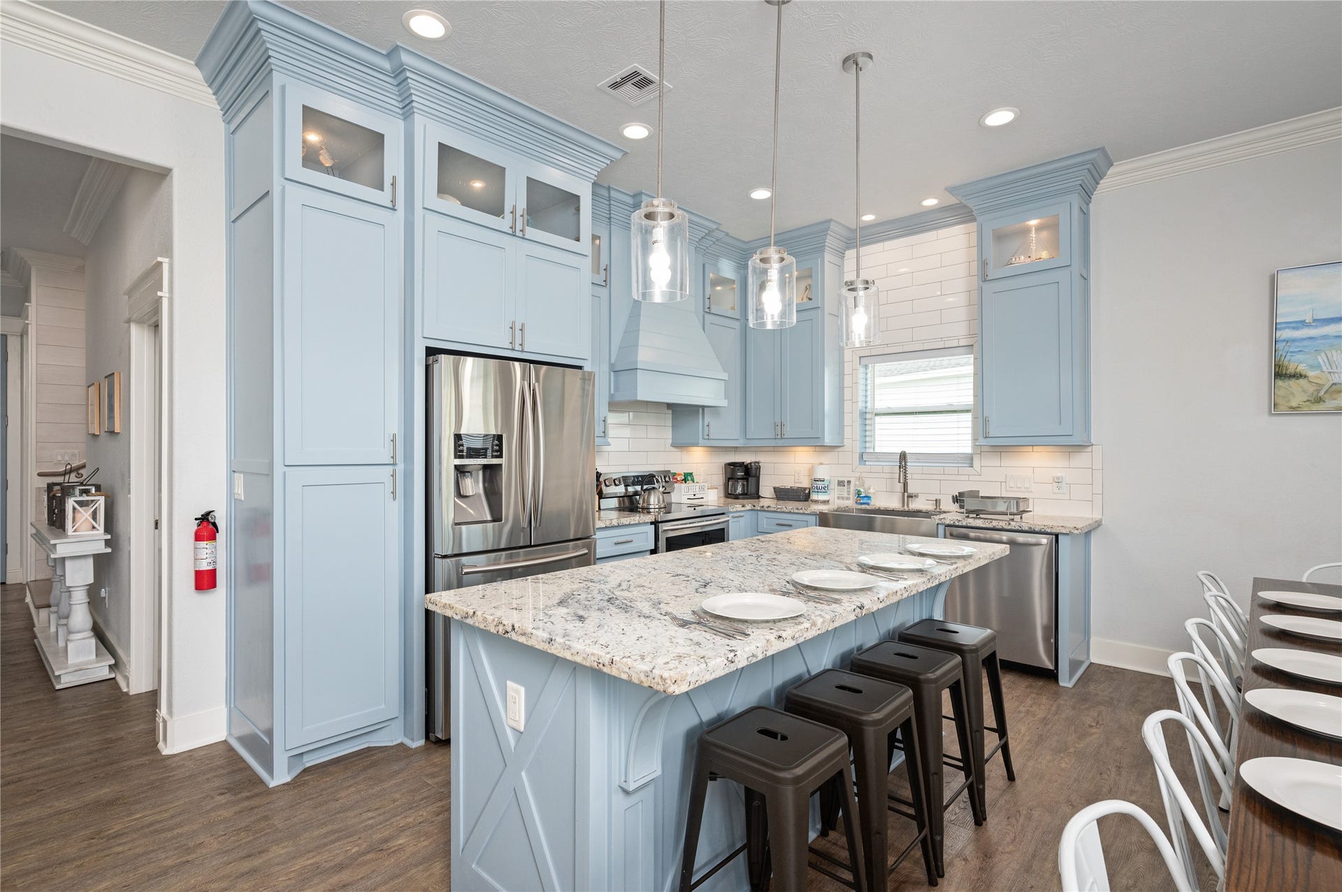 997 S Redfish Street, Crystal Beach, TX 77650 Cooking feels effortless in your beautifully appointed kitchen, where abundant cabinetry, granite counters, stainless appliances, and a generous island give you room to spread out.