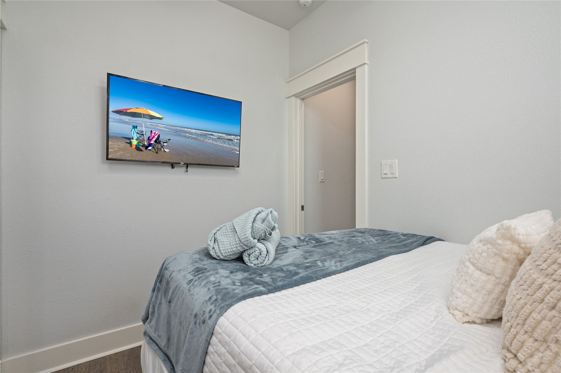 997 S Redfish Street, Crystal Beach, TX 77650 Kick back in bed and enjoy your favorite shows in a comfortable space designed for easy downtime.