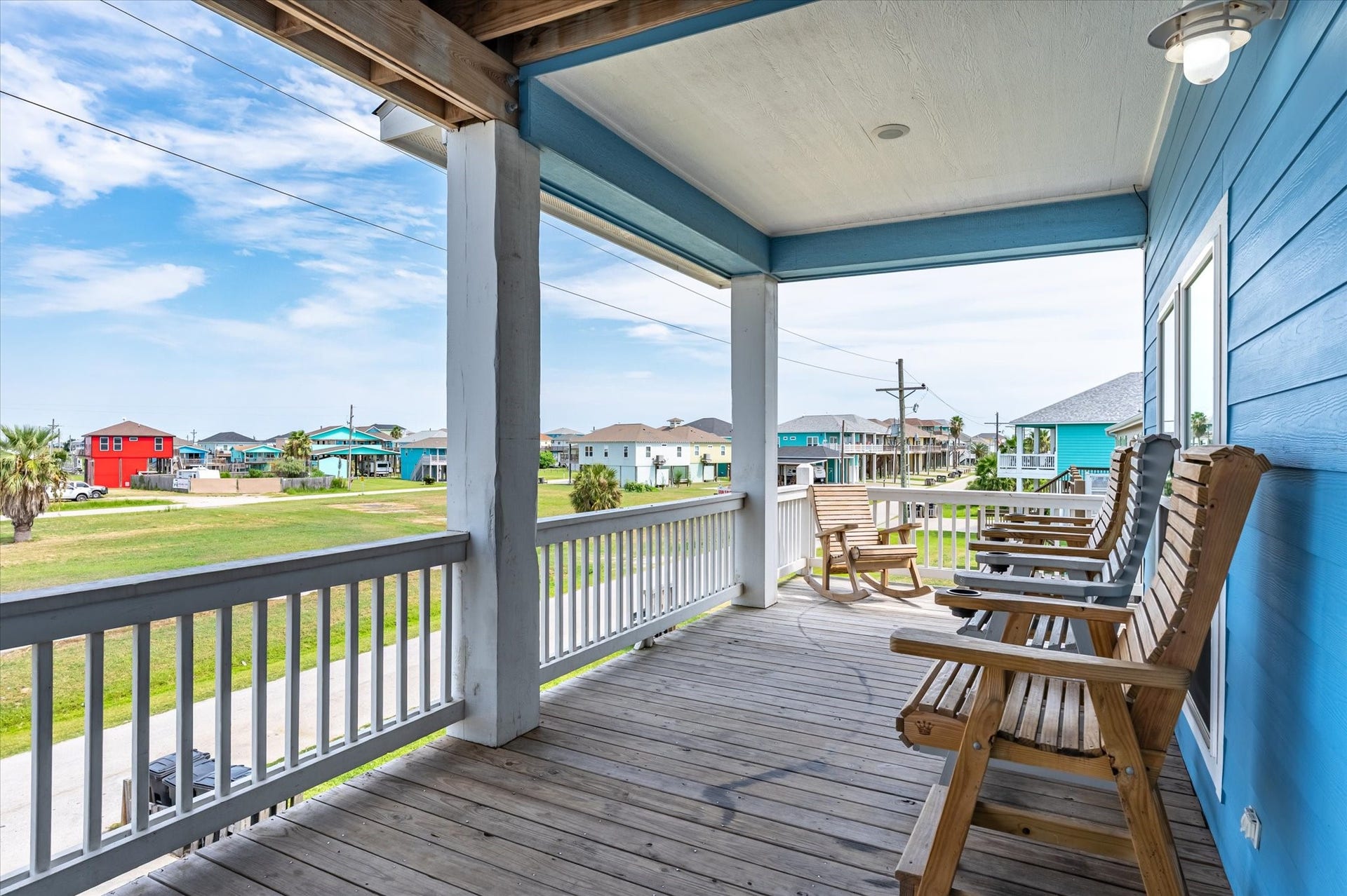 997 S Redfish Street, Crystal Beach, TX 77650 Mornings start easy on your covered balcony, rocking with a cup of coffee while the coastal neighborhood wakes up around you.
