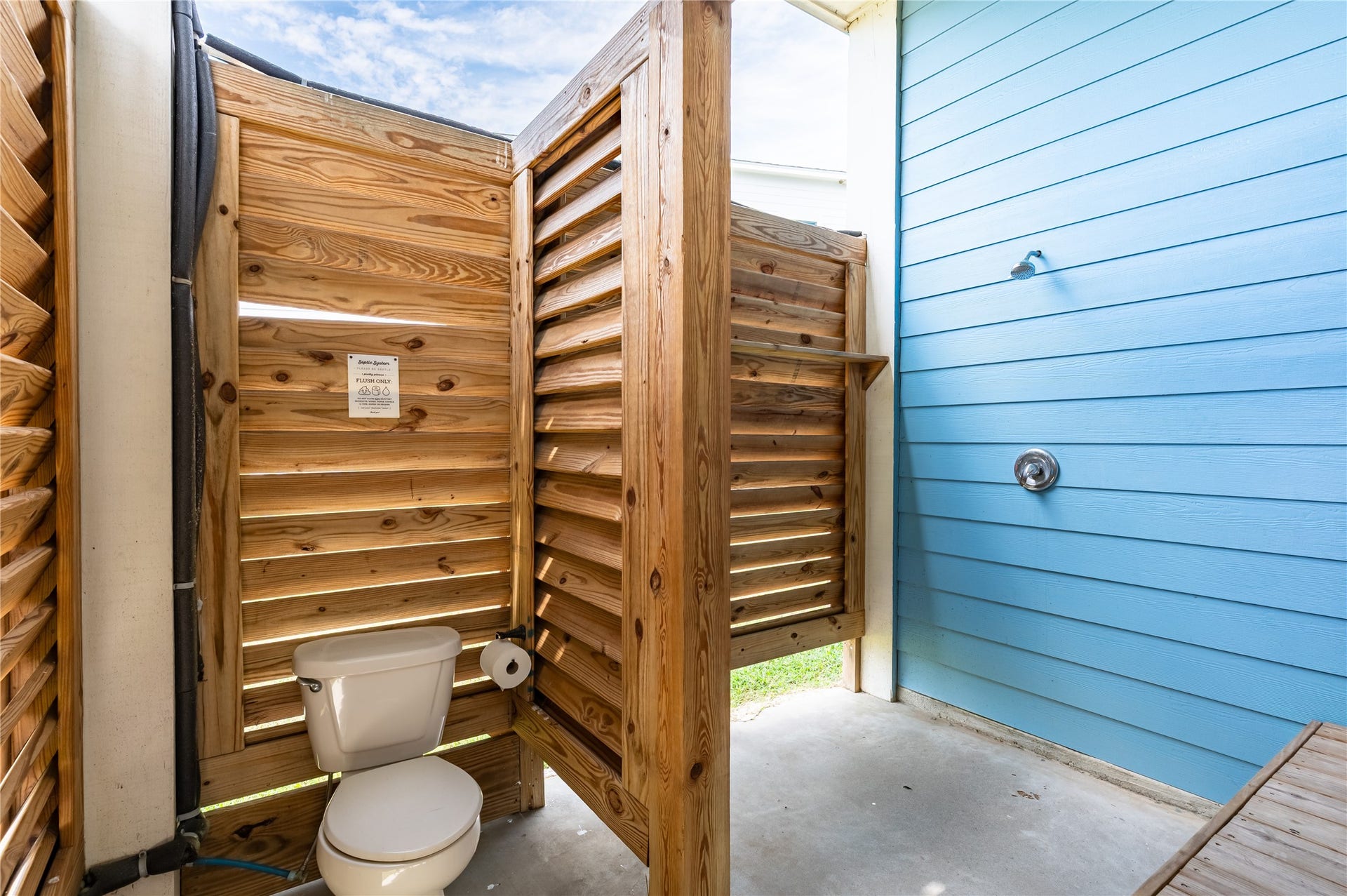 997 S Redfish Street, Crystal Beach, TX 77650 Coming home sandy is no problem with your private outdoor shower and changing area ready for an easy rinse after the beach.