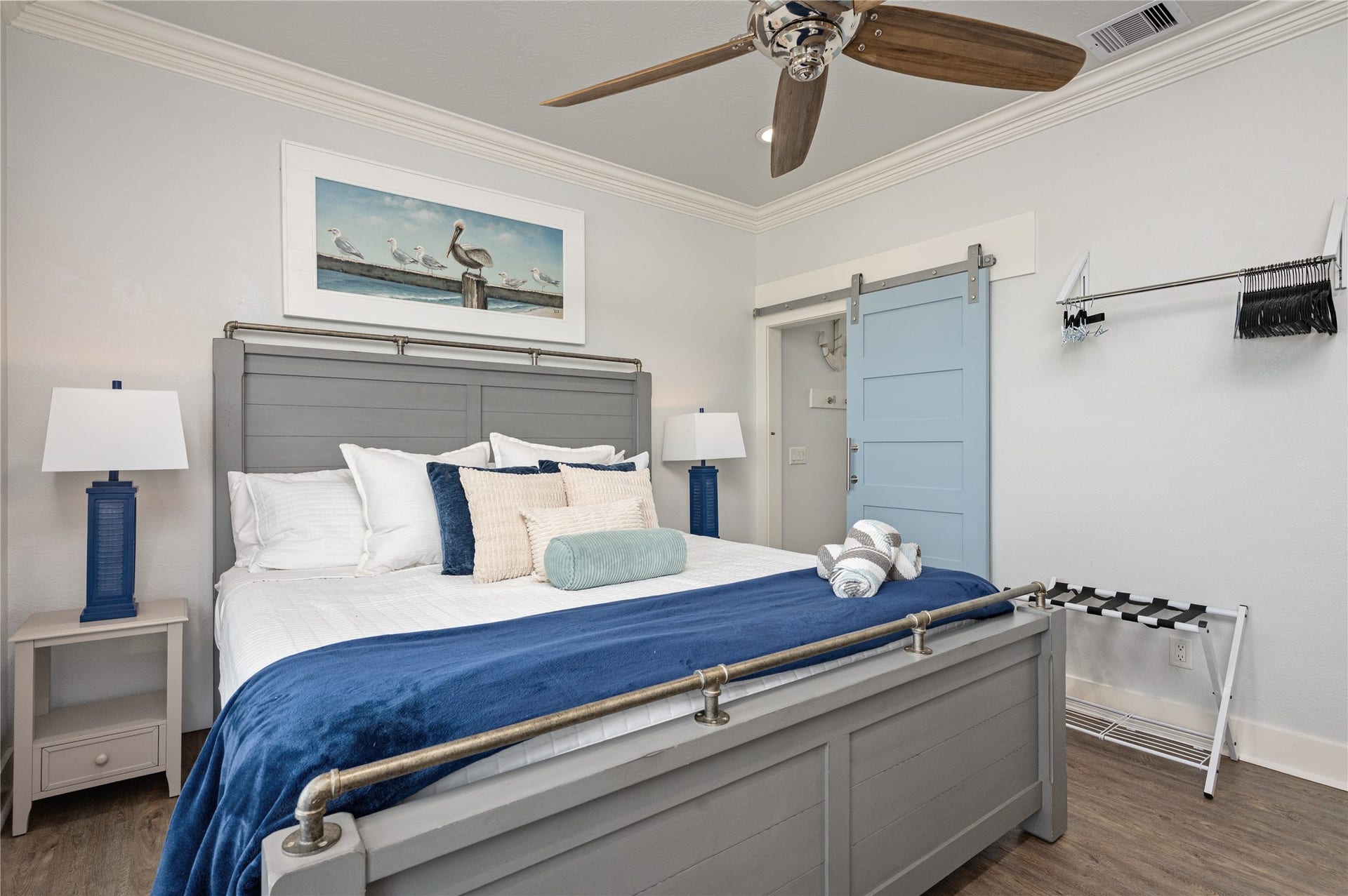 997 S Redfish Street, Crystal Beach, TX 77650 Unwind in a comfortable bedroom with coastal touches, a ceiling fan, and a space that feels tucked away from the main living areas.