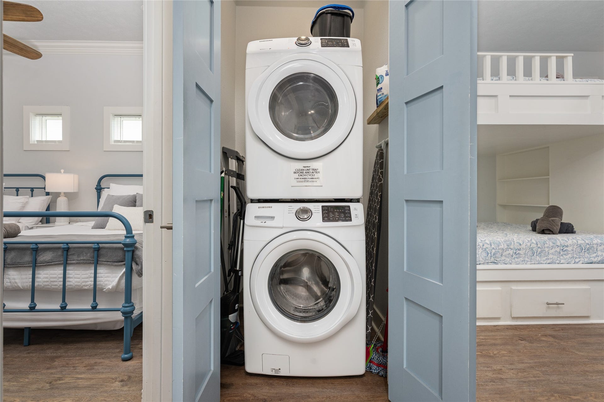 997 S Redfish Street, Crystal Beach, TX 77650 Laundry stays tucked neatly between the bedrooms with a space-saving stacked washer and dryer right where you need them.