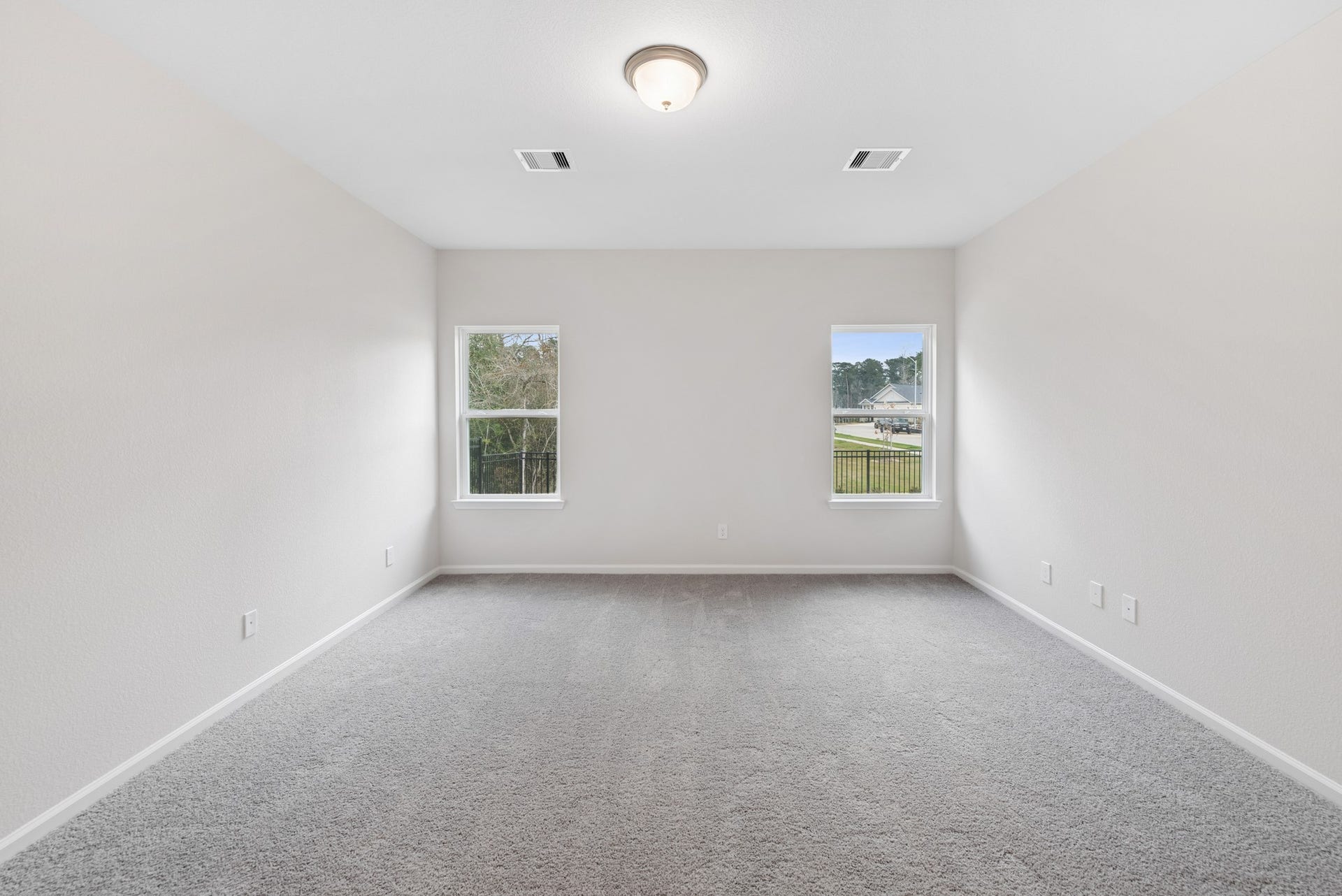 15207 Black Scoter Court, Magnolia, TX 77354 The Cardinal II- Primary Suite. Photos of home shown are for illustration only; actual features, colors, and upgrades may vary.