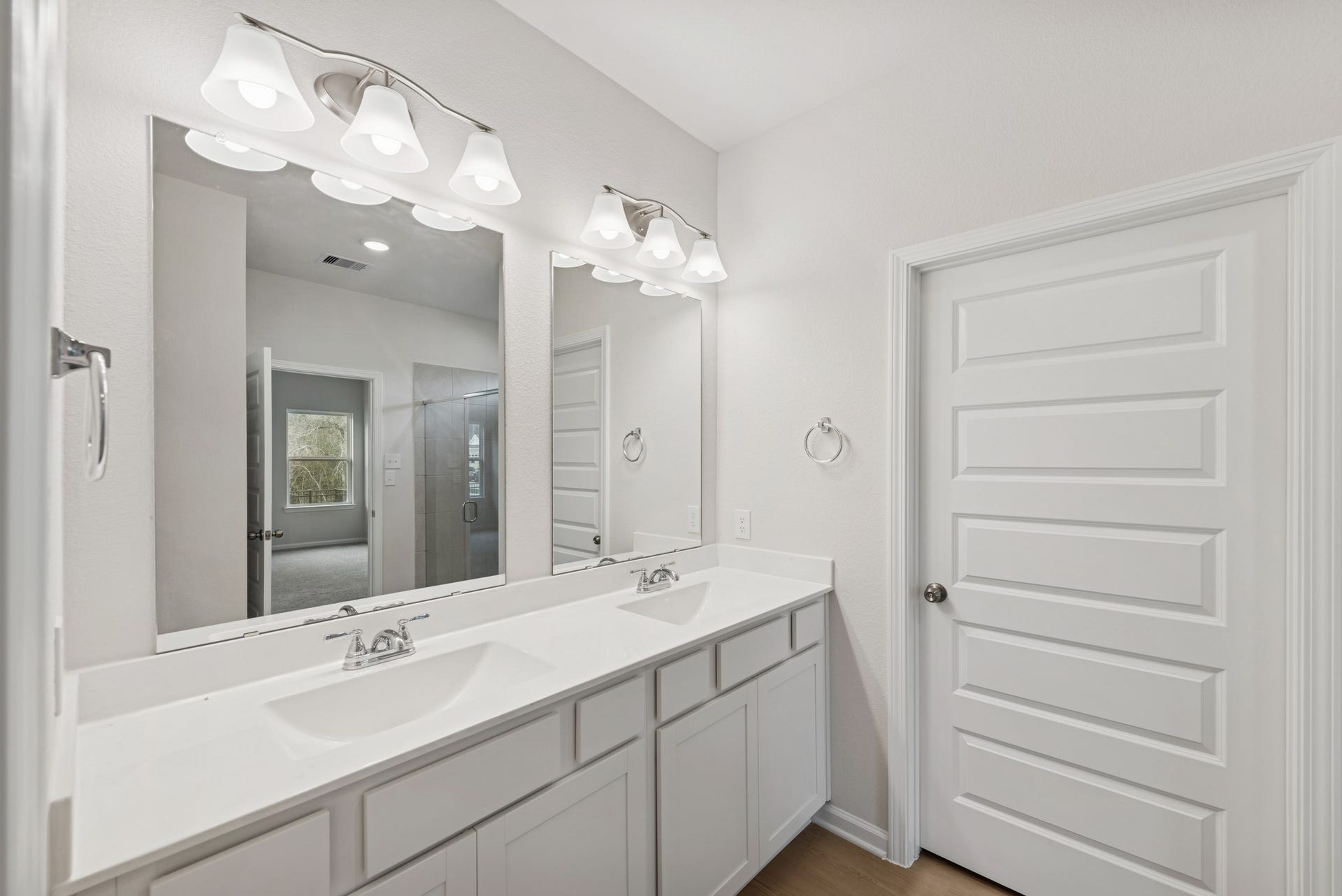 15207 Black Scoter Court, Magnolia, TX 77354 The Cardinal II- Primary Bathroom with Dual Vanities. Photos of home shown are for illustration only; actual features, colors, and upgrades may vary.