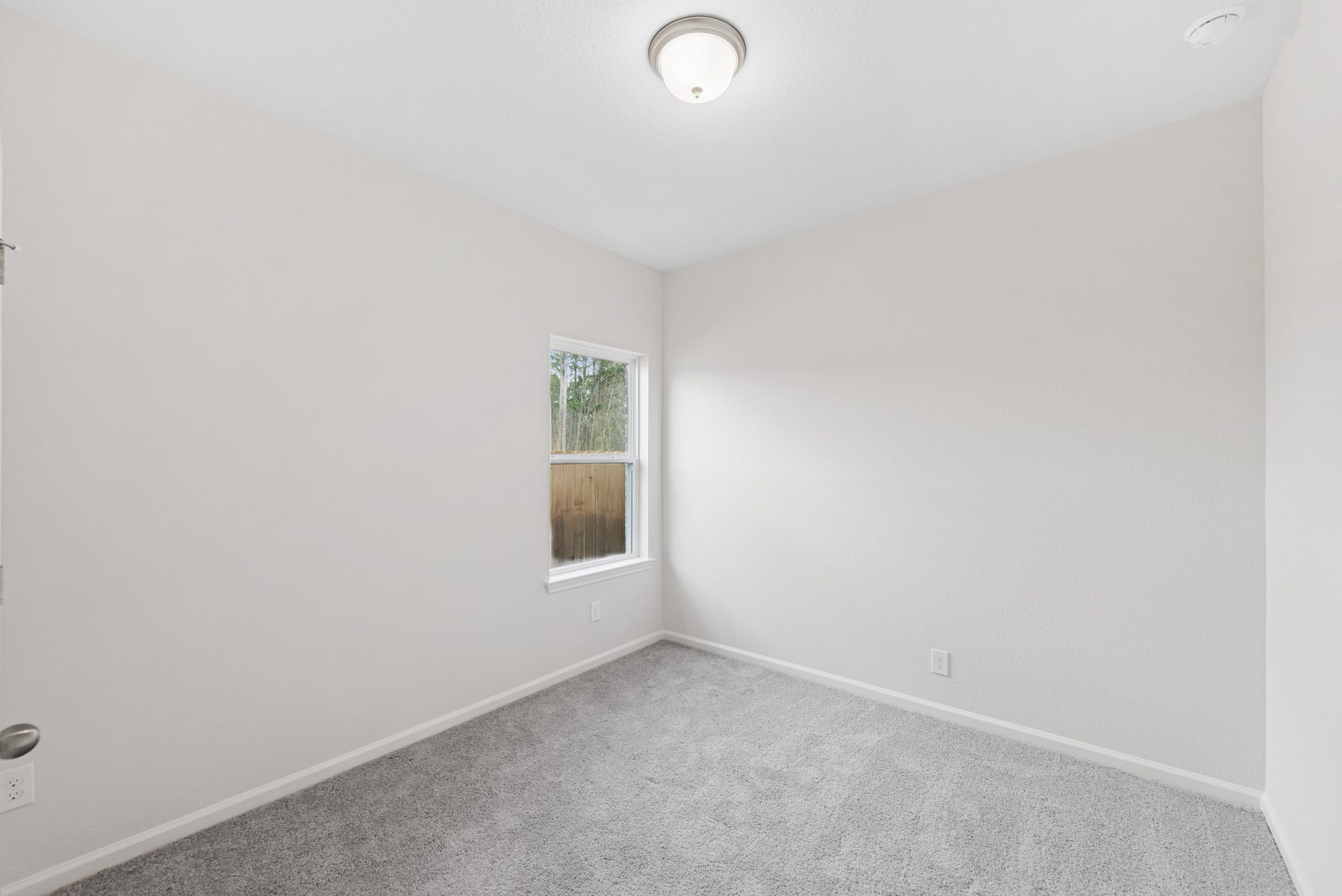 15207 Black Scoter Court, Magnolia, TX 77354 The Cardinal II- Bedroom 3. Photos of home shown are for illustration only; actual features, colors, and upgrades may vary.