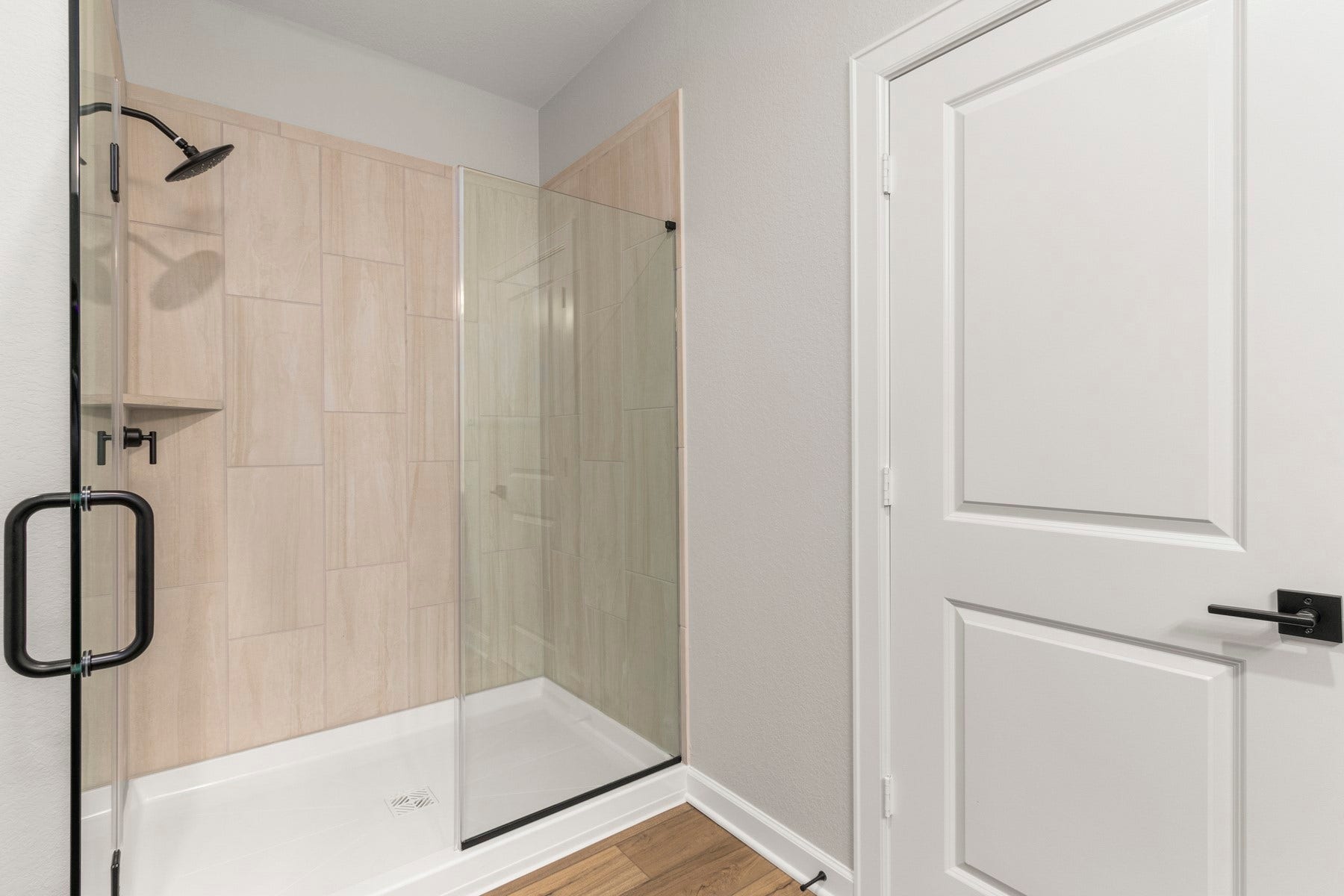 14001 Starboard Reach Drive, Texas City, TX 77510 The master bathroom features large tiled walk in shower.