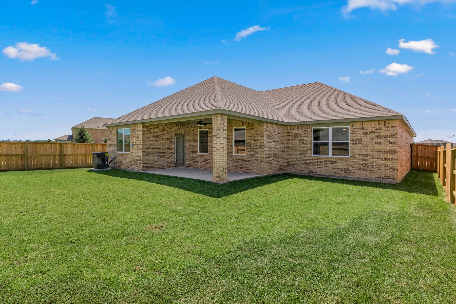 14001 Starboard Reach Drive, Texas City, TX 77510 The spacious covered patio is perfect for outdoor entertaining. Photo is for example purpose. Brick color may be different than example photo.