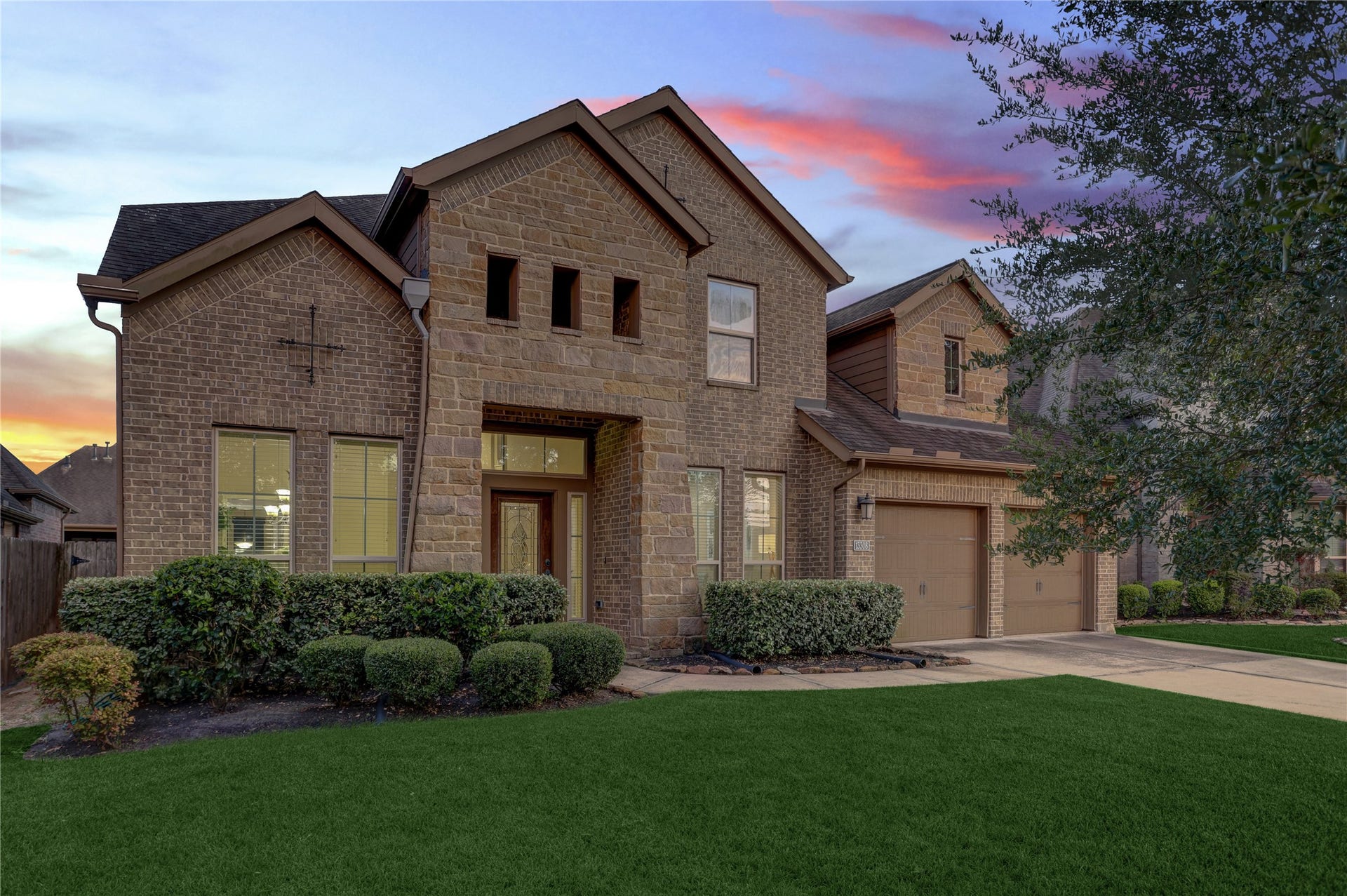 13308 Paxton Hill Court, Pearland, TX 77584 From the stunning brick and stone elevation to the beautifully manicured landscaping, this home delivers exceptional curb appeal from the moment you arrive. This residence offers the perfect combination of elegance, comfort, and everyday functionality.