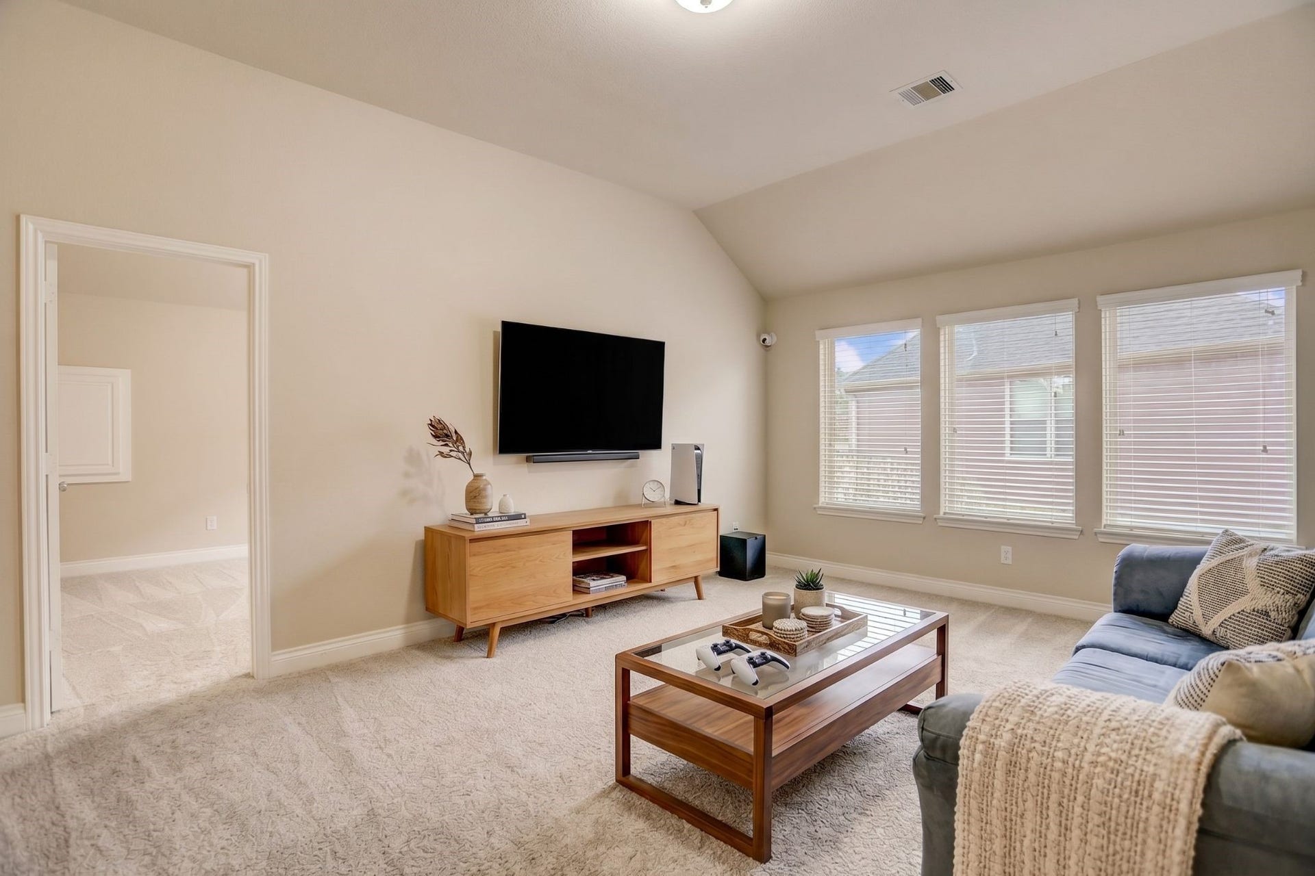 13308 Paxton Hill Court, Pearland, TX 77584 This versatile upstairs flex space has been virtually staged to highlight its endless possibilities. Whether you envision a game room, media lounge, playroom, fitness area, or teen retreat, this spacious room adapts to your lifestyle. Large windows fill the space with natural light, creating a bright and welcoming atmosphere that's perfect for relaxing, entertaining, or everyday living.