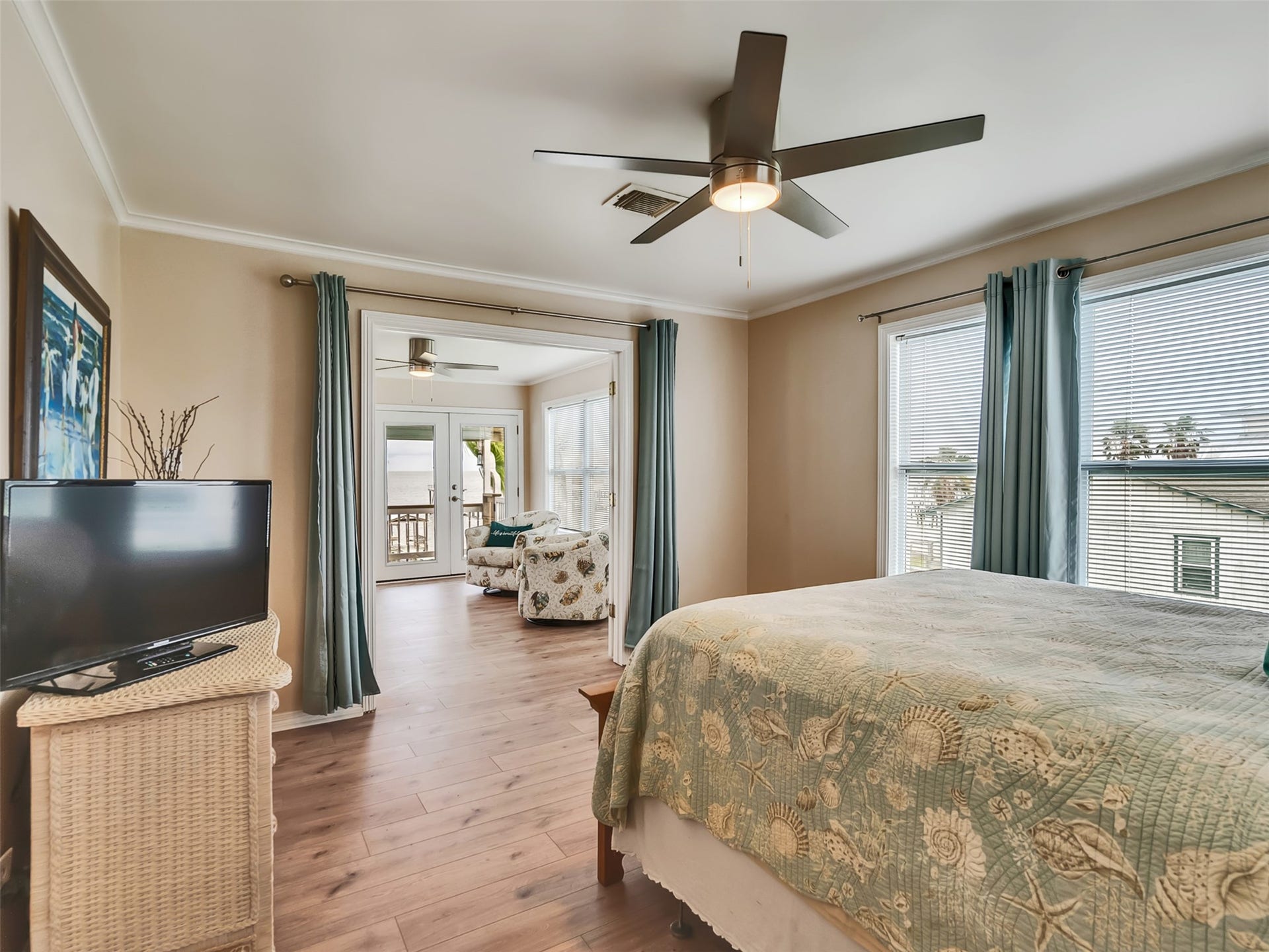 1309 8th Street, San Leon, TX 77539 This primary bedroom is spacious and cozy.