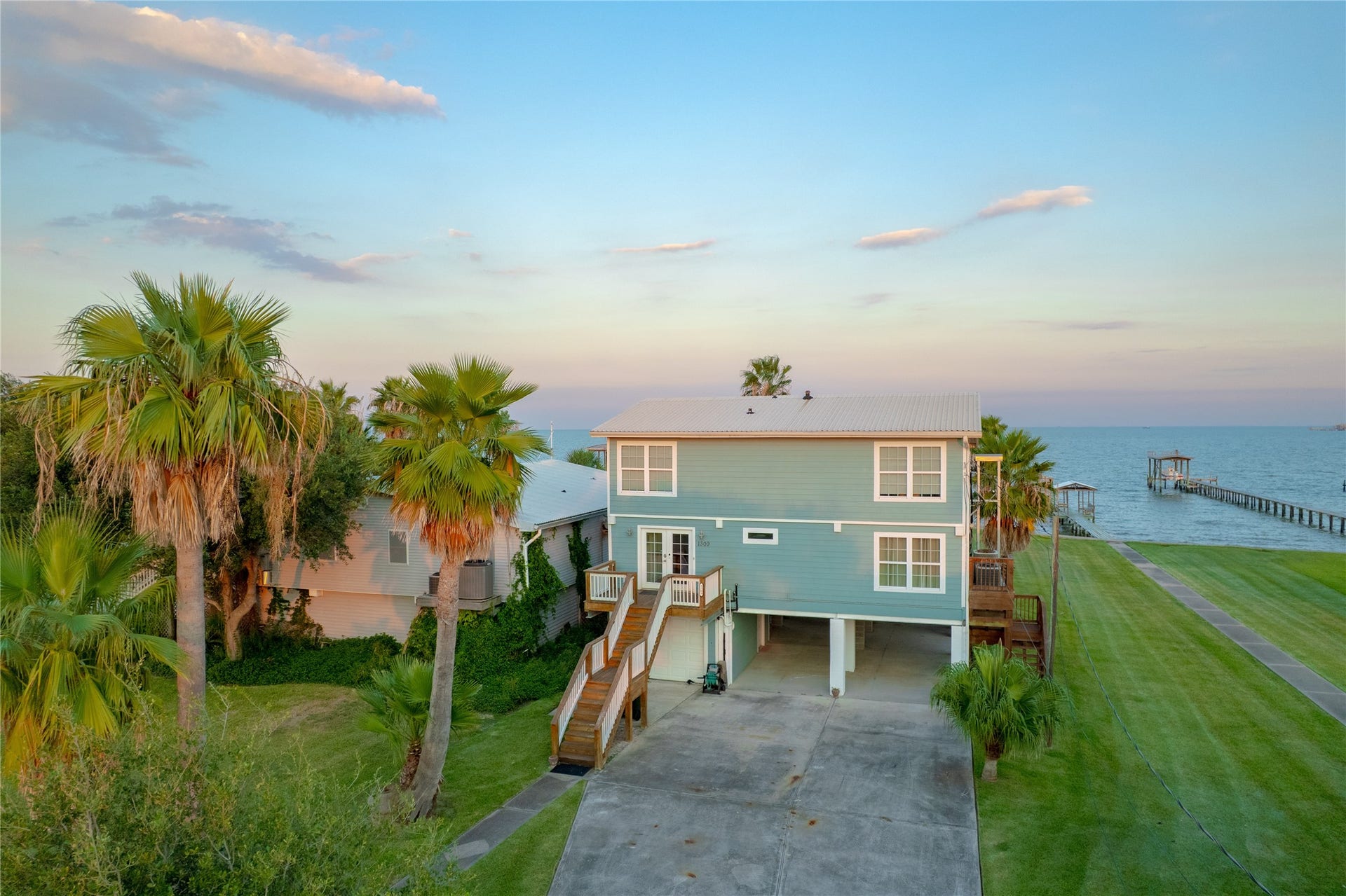 1309 8th Street, San Leon, TX 77539 Imagine waking up to the bay, spending your days fishing, and enjoying the kind of laid-back lifestyle where the pace is a little slower and the sunsets are a little sweeter.