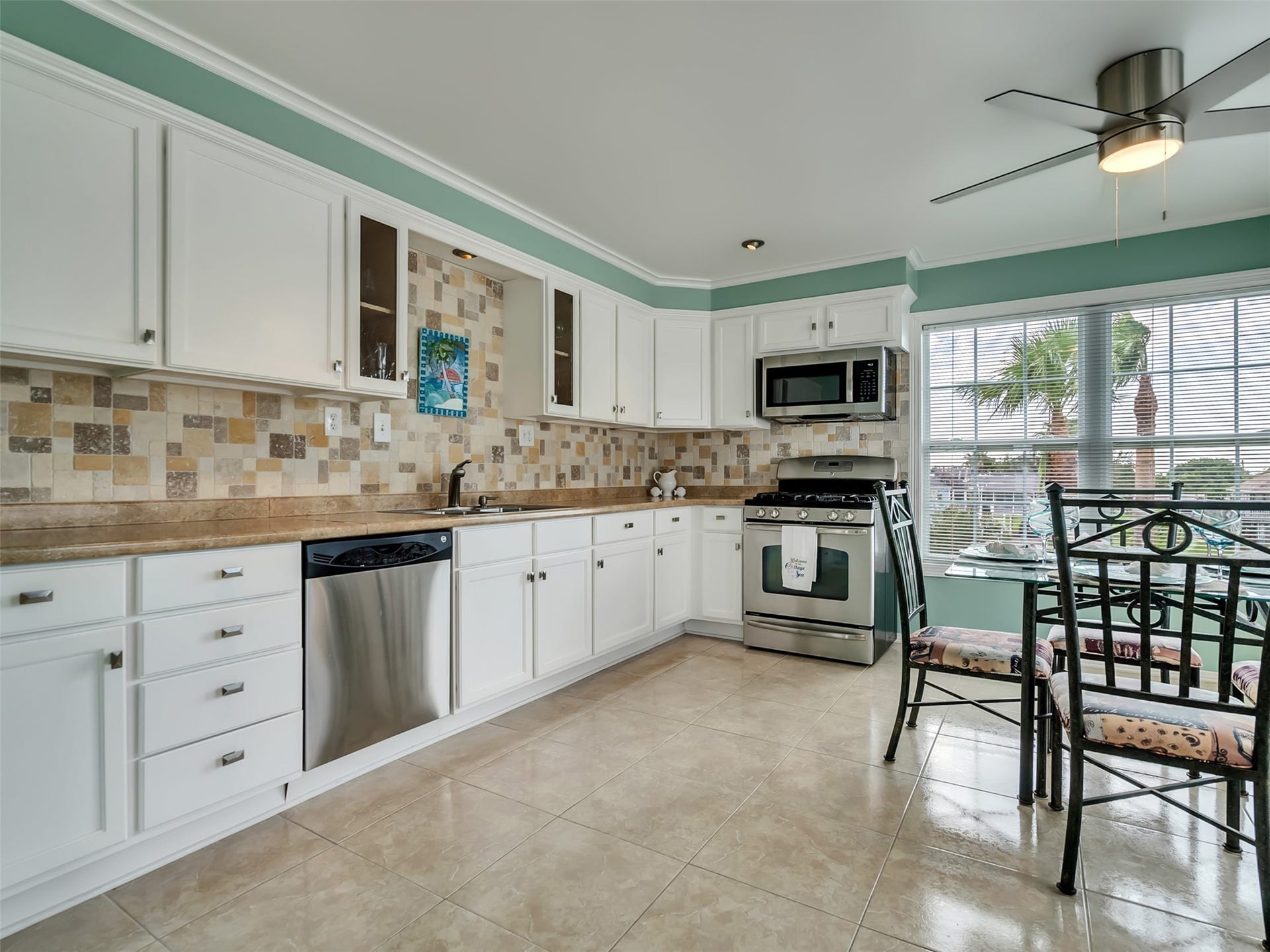 1309 8th Street, San Leon, TX 77539 Sleek stainless appliances add a nice touch.