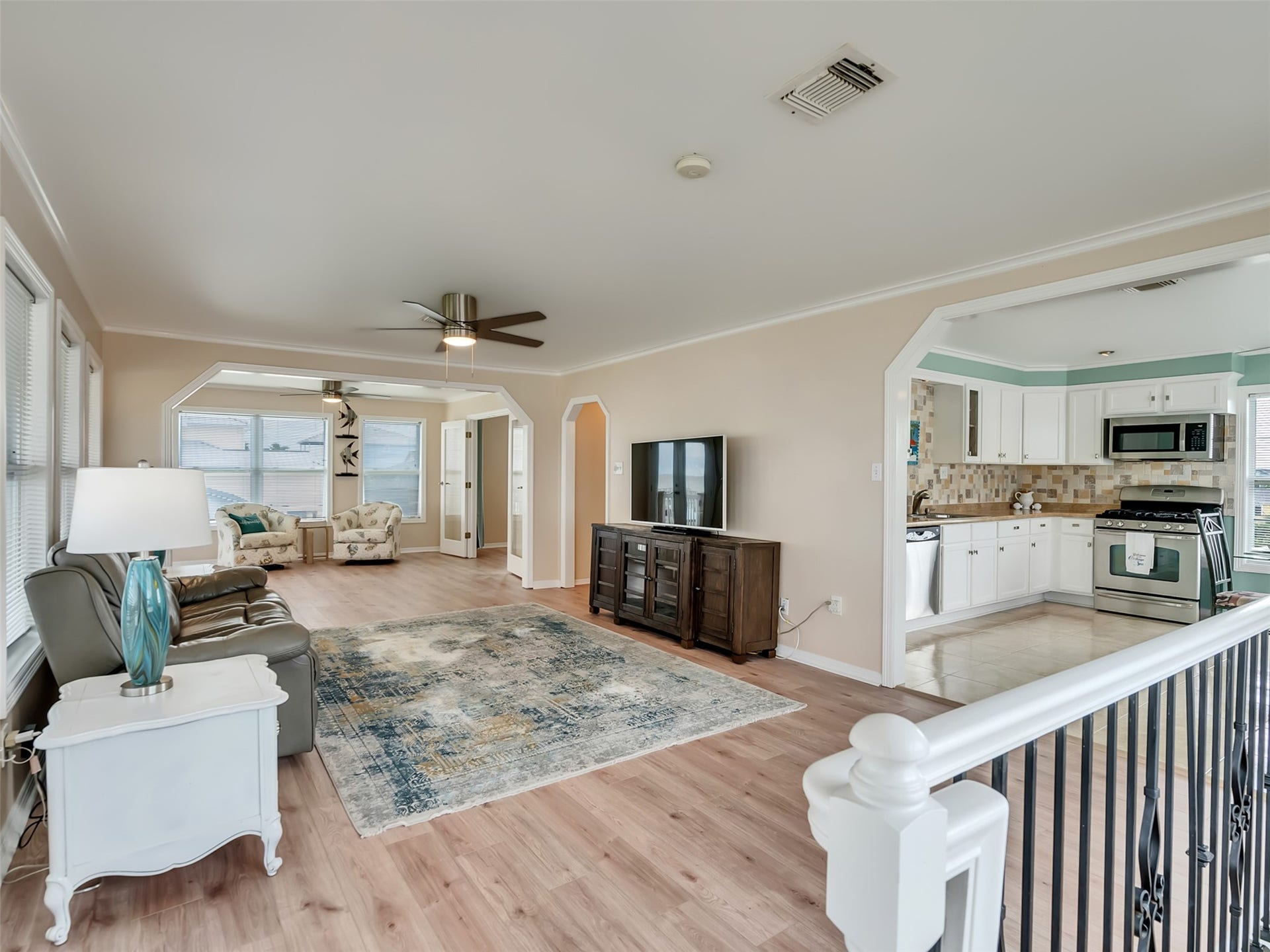 1309 8th Street, San Leon, TX 77539 Living room flows seamlessly into the kitchen.