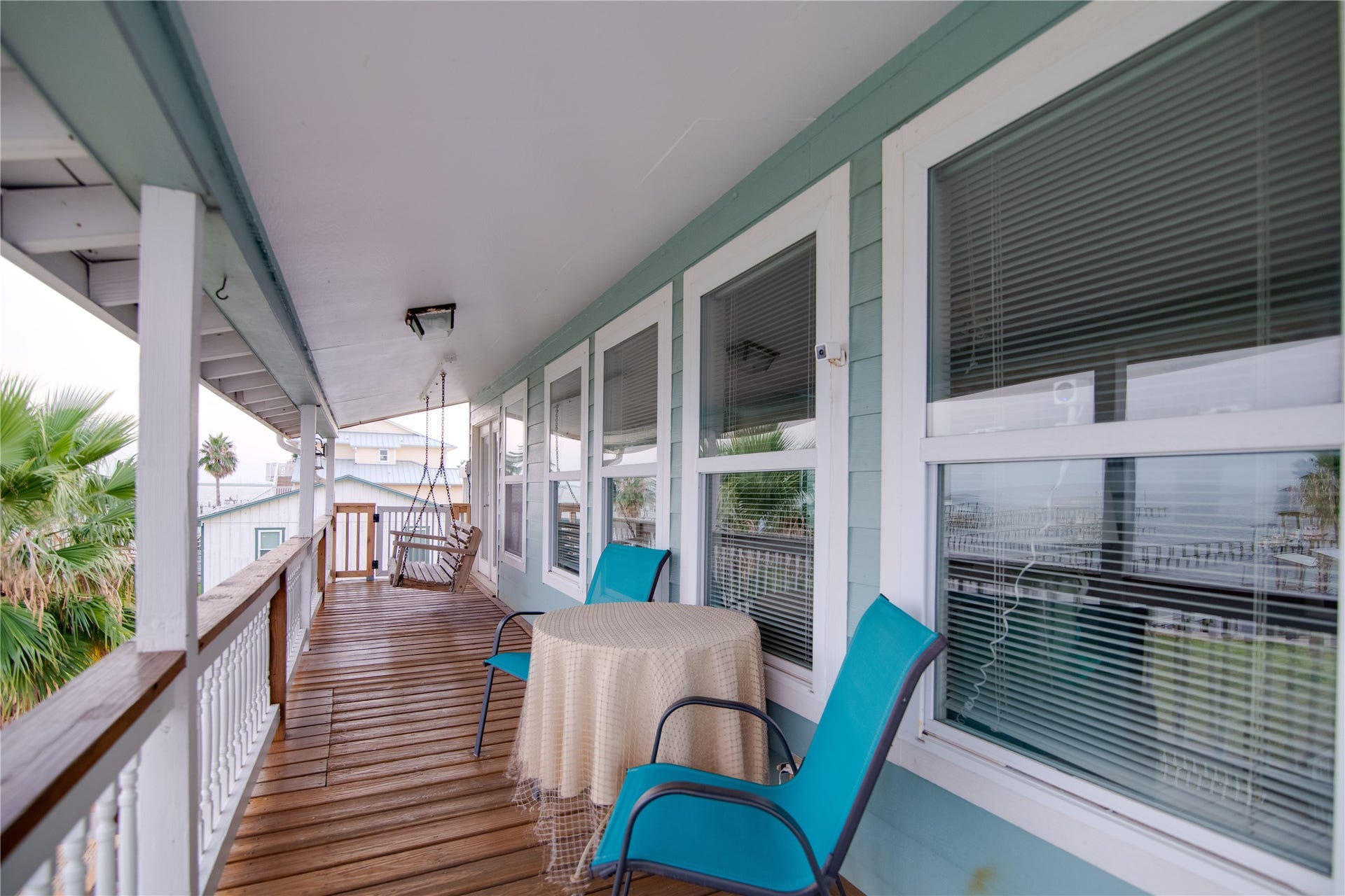 1309 8th Street, San Leon, TX 77539 This balcony offers breathtaking views of the bay, providing a perfect spot to relax and take in the tranquil waters.