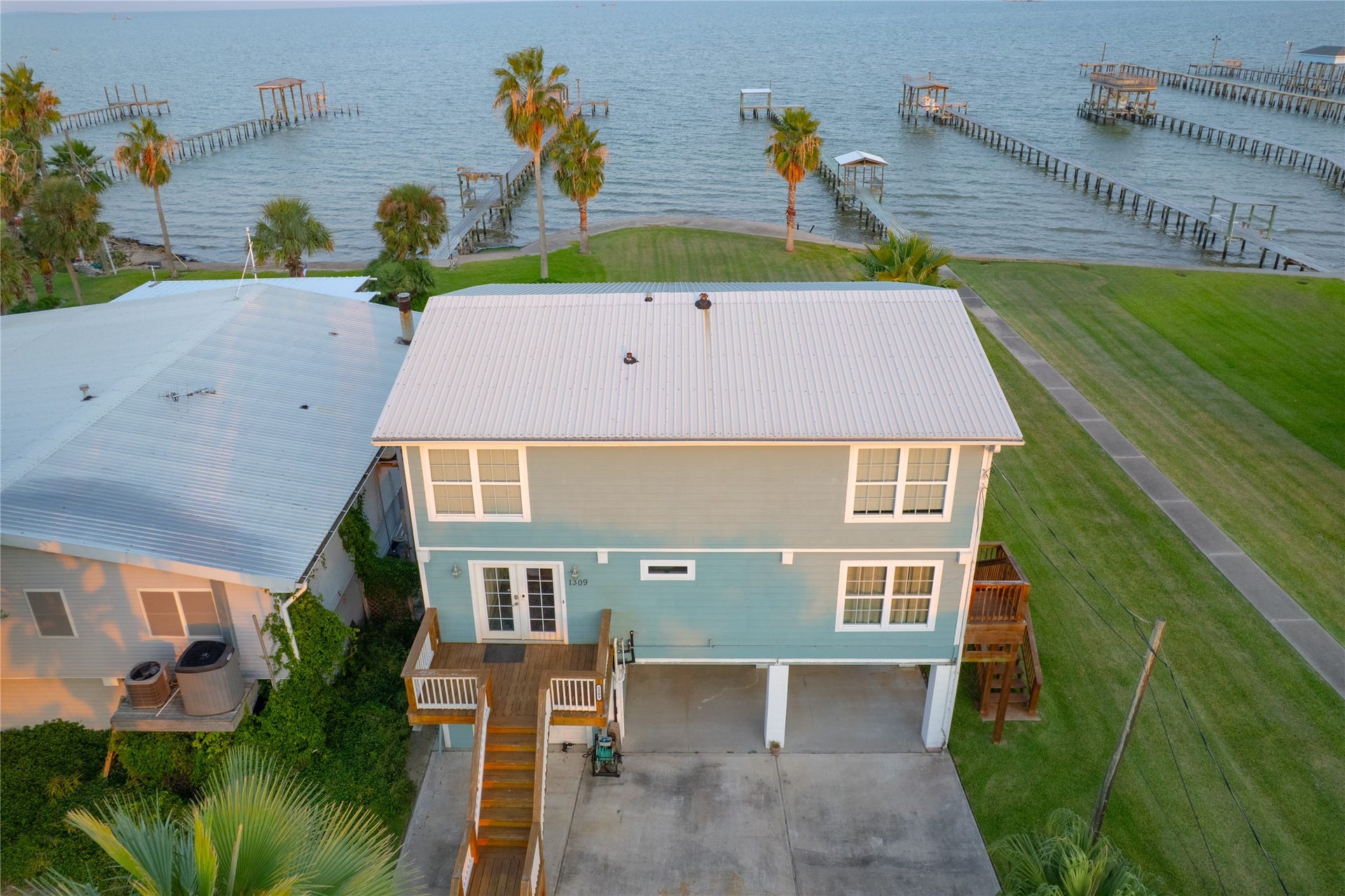 1309 8th Street, San Leon, TX 77539 "Dont miss your chance to embrace the ultimate waterfront lifestyle! Schedule a tour today and experience all this stunning property has to offer before its gone."