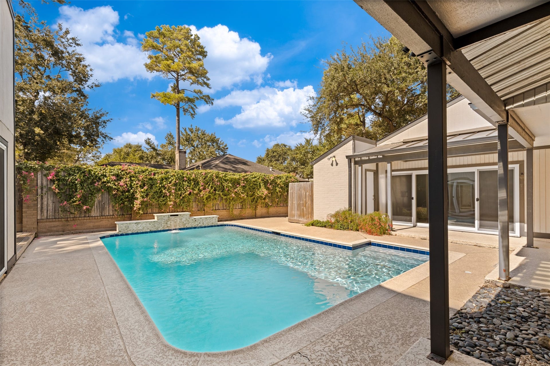 8849 Larston Street, Spring Valley Village, TX 77055 Backyard pool - left side behind house has more space for entertaining