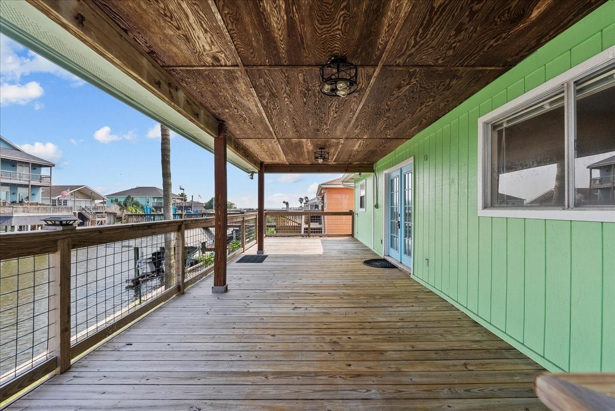 984 Bonita Street, Bayou Vista, TX 77563 Relax, unwind, and enjoy peaceful waterfront views from your spacious covered deck.