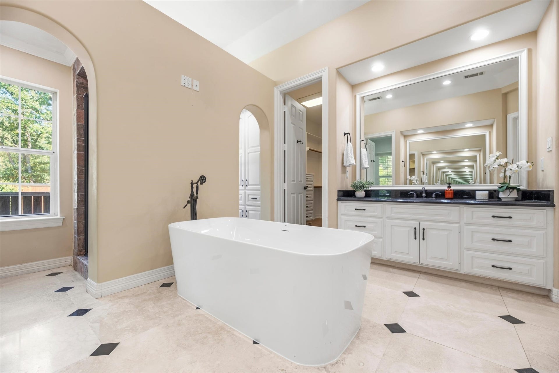 Primary bath with new sunken tub and separate walk in shower.