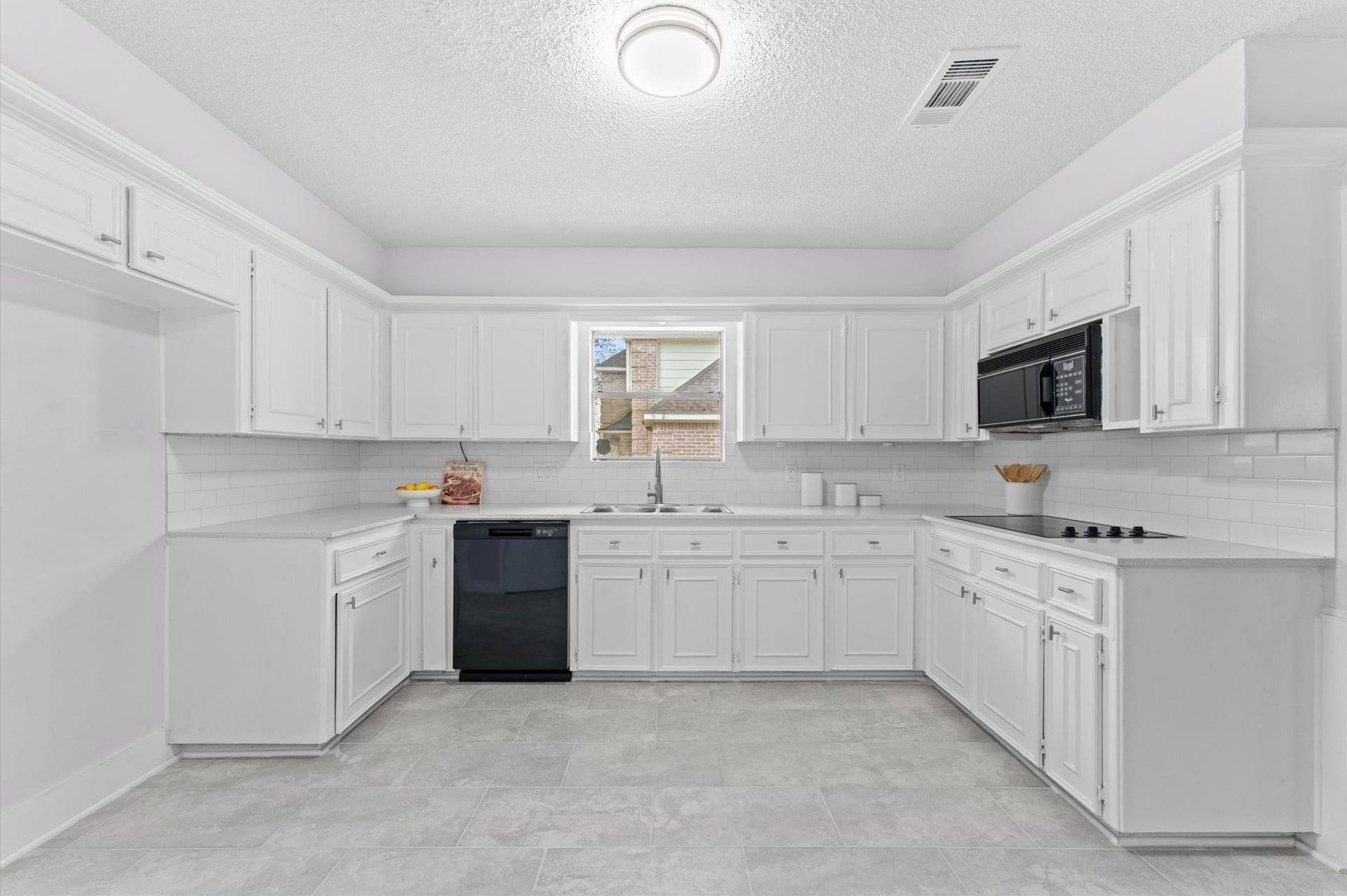 An ideal kitchen design includes an abundance of cabinets, allowing you to keep those gorgeous countertops clutter-free!
