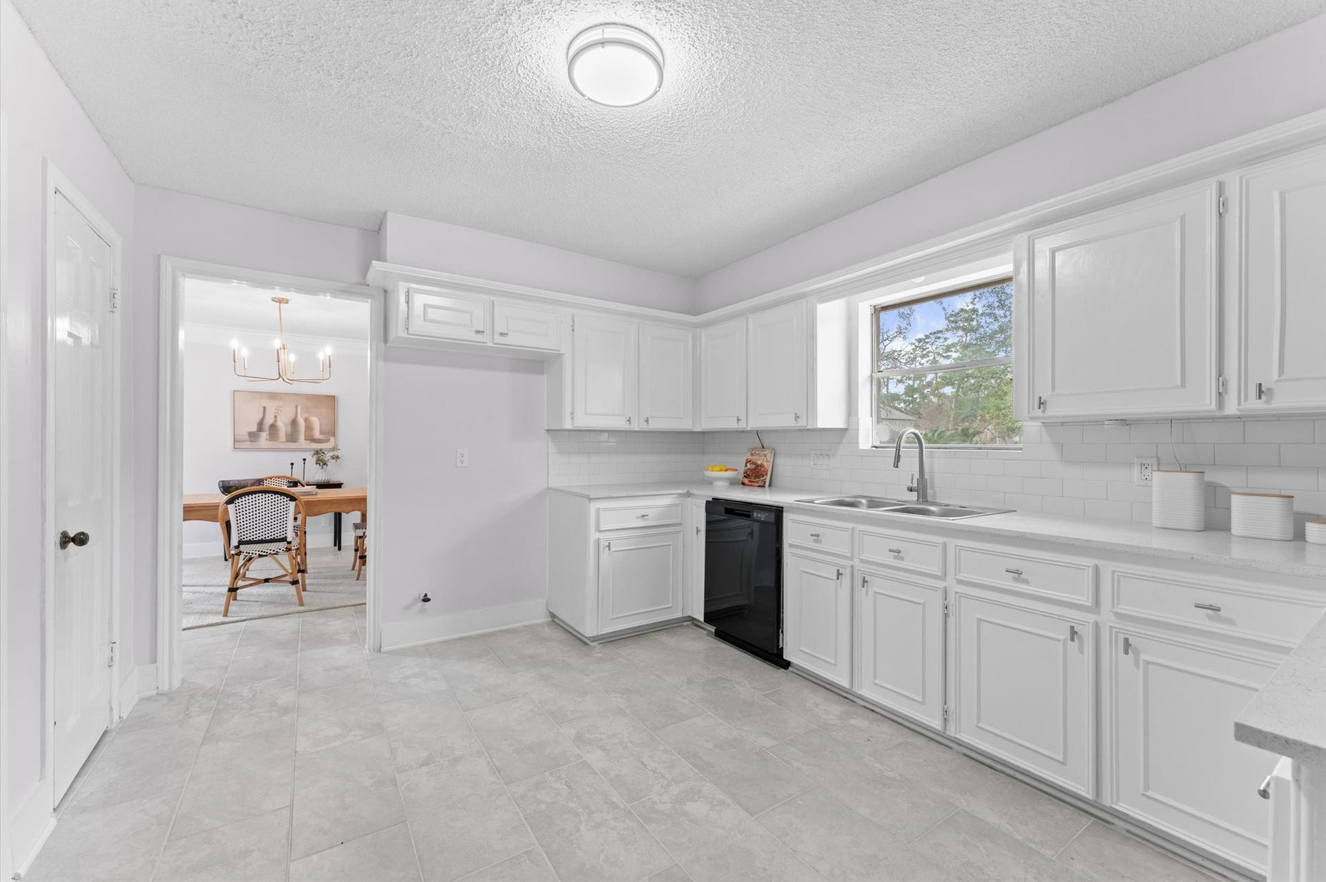 The formal dining room rests on the opposite side of the kitchen from the breakfast room, which means meal service is made easy regardless of where you gather.