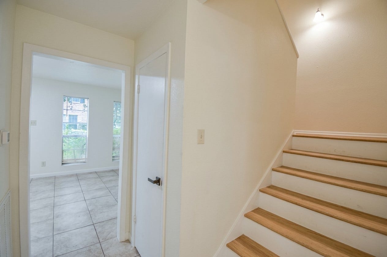 427 Sunset Drive, #7, Dickinson, TX 77539 Stairs with view of living room