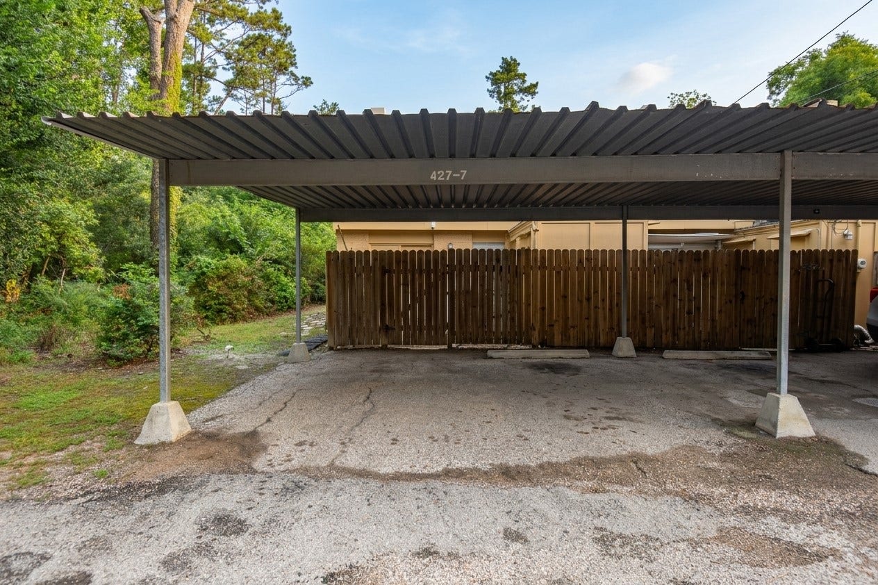 427 Sunset Drive, #7, Dickinson, TX 77539 Your vehicles stay protected under the assigned 2-car carport.