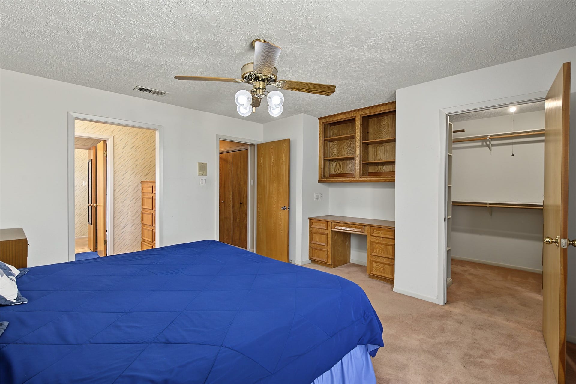 Built-ins, large closet and access to the extra room.