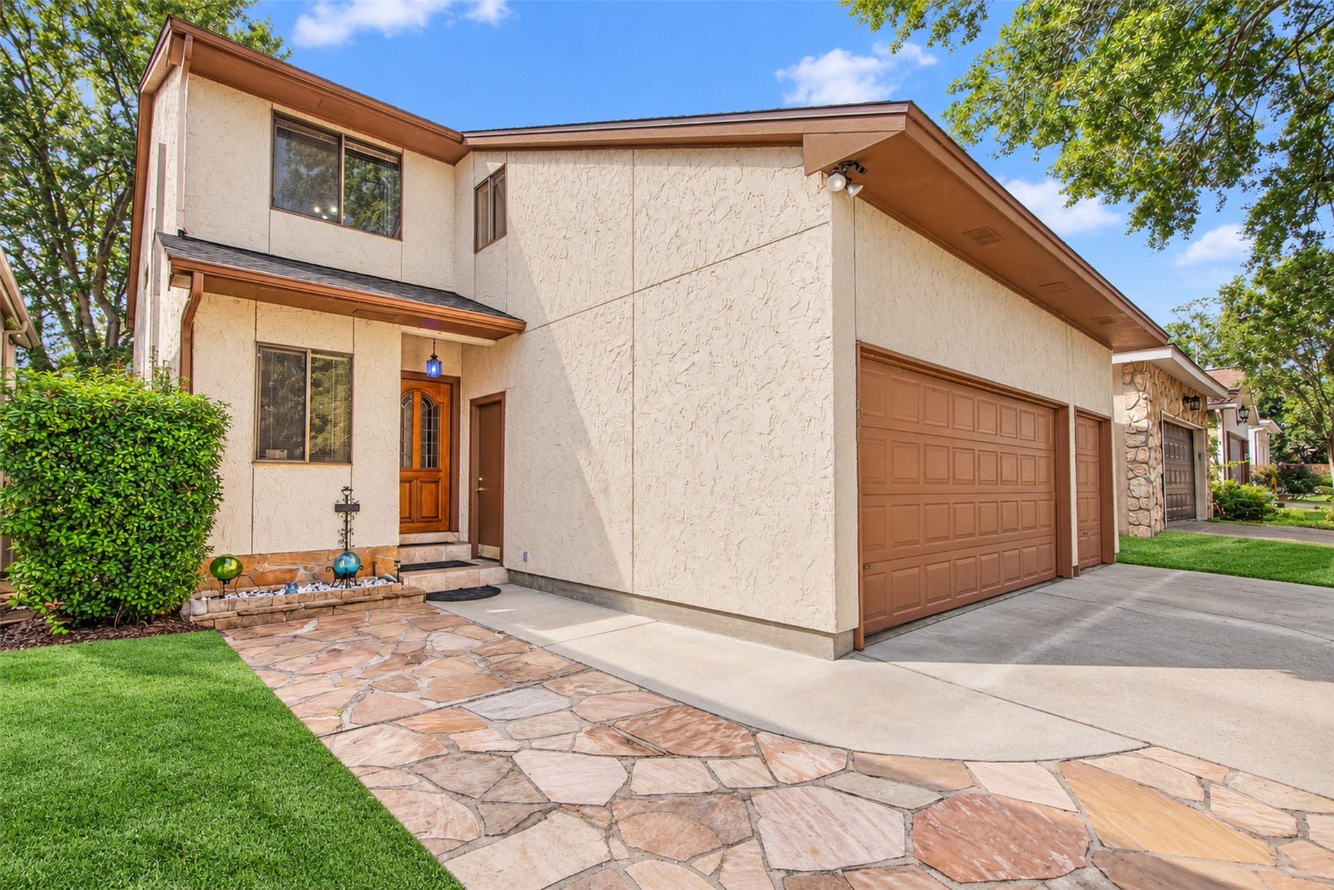 Lovely curb appeal with a three car garage for plenty of storage.