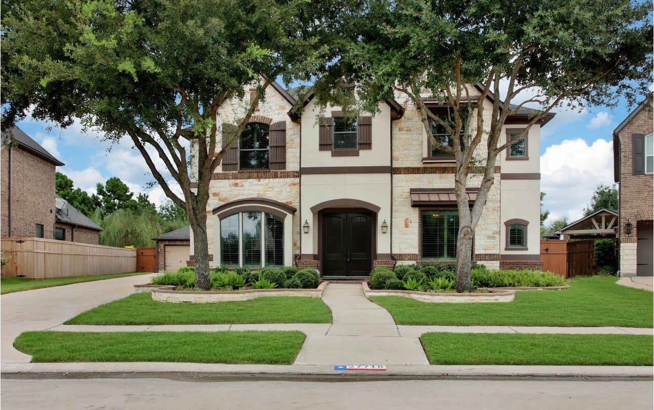 Nestled behind mature trees and beautiful landscaping, this home offers exceptional curb appeal with a sophisticated brick, stone & stucco elevation, offering a warm, welcoming first impression.