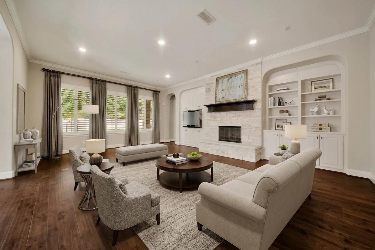 Good times and great conversations are sure to flow with family and friends in this cozy living area! (Virtually Staged)