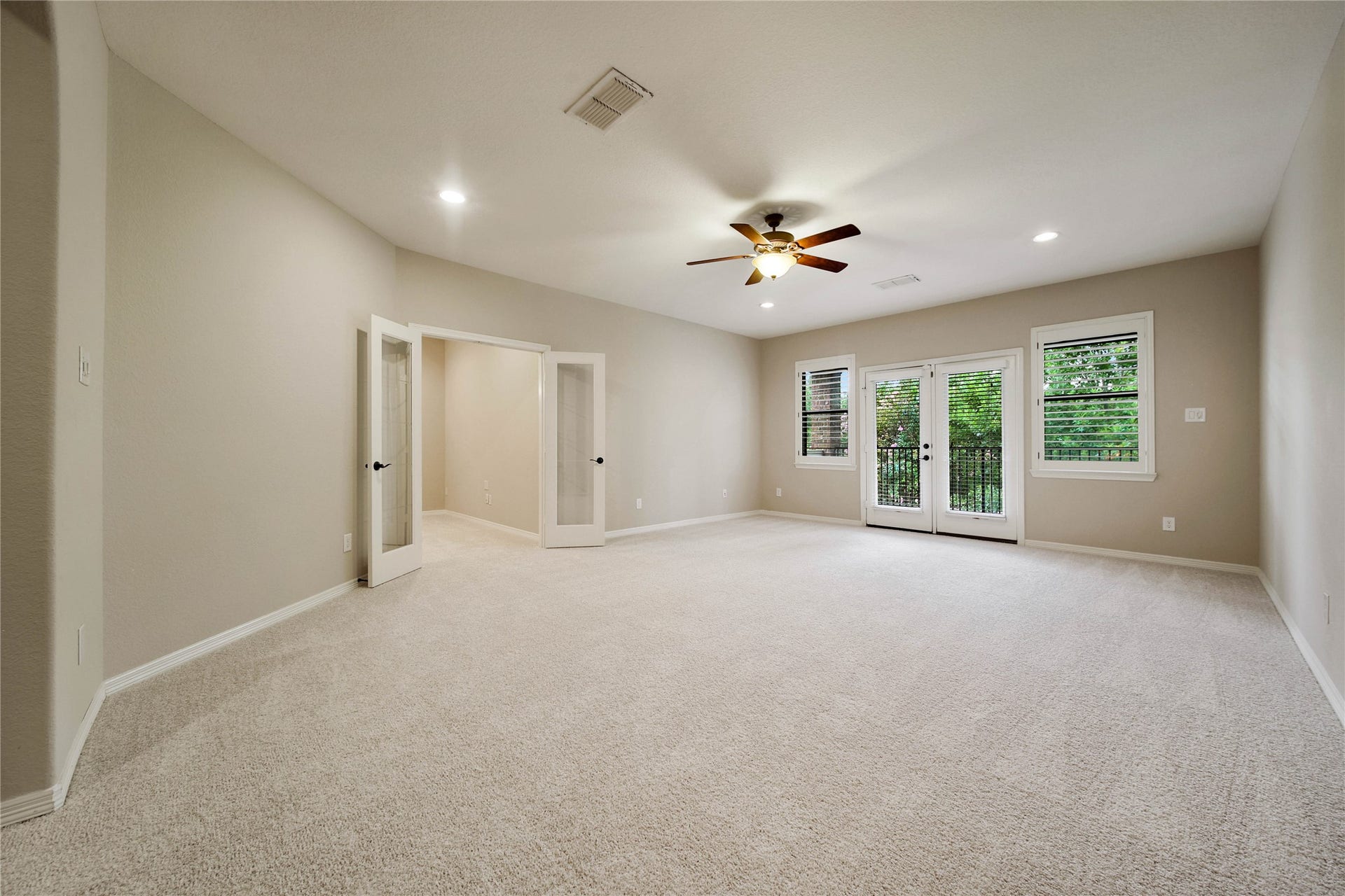 A private media room off the gameroom completes the upstairs entertainment area, offering a comfortable space designed for unforgettable movie nights and gatherings.