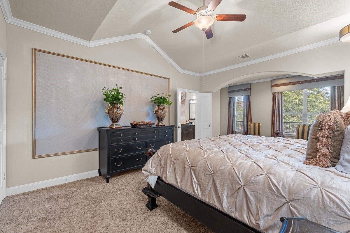 416 Via Regatta Drive, Webster, TX 77598 On the second level, find a massive primary retreat complete with a rare dedicated sitting room and private balcony access featuring gorgeous hand painted details