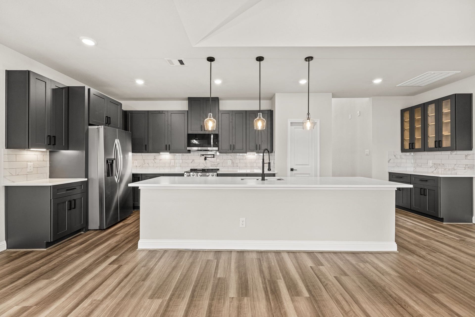 This home is currently under construction, with the opportunity to select your preferred exterior and interior finishes. Please contact our Sales Consultant for full details, available selections, and current availability. Photo shown is a sample of a recently completed home and is for reference only.