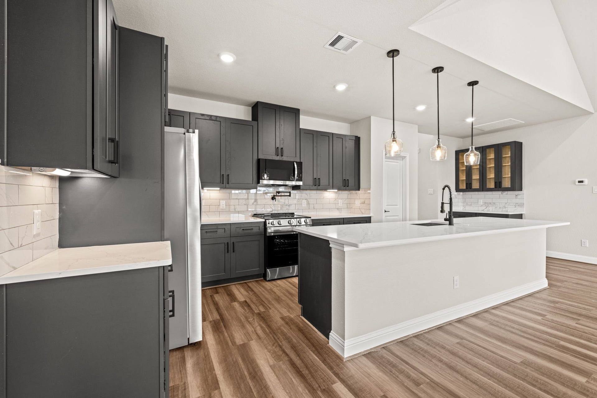 This home is currently under construction, with the opportunity to select your preferred exterior and interior finishes. Please contact our Sales Consultant for full details, available selections, and current availability. Photo shown is a sample of a recently completed home and is for reference only.