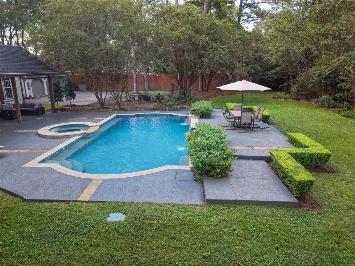14026 Champions Hamlet Court, Houston, TX 77069 Beautiful grounds, built to last. A Rainbird irrigation system installed in 2022 waters the front and back yards, giving this fenced backyard its fresh, manicured look, with room to play, lounge, and entertain.