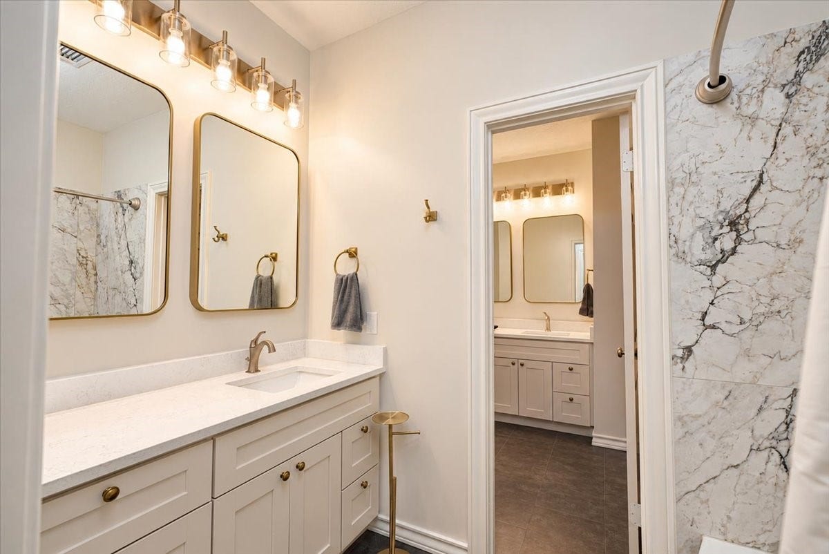 14026 Champions Hamlet Court, Houston, TX 77069 Shared between two secondary bedrooms, this fully remodeled 2024 bath features a new tub/shower with upgraded tile, and a clean, modern finish that makes everyday routines easy.