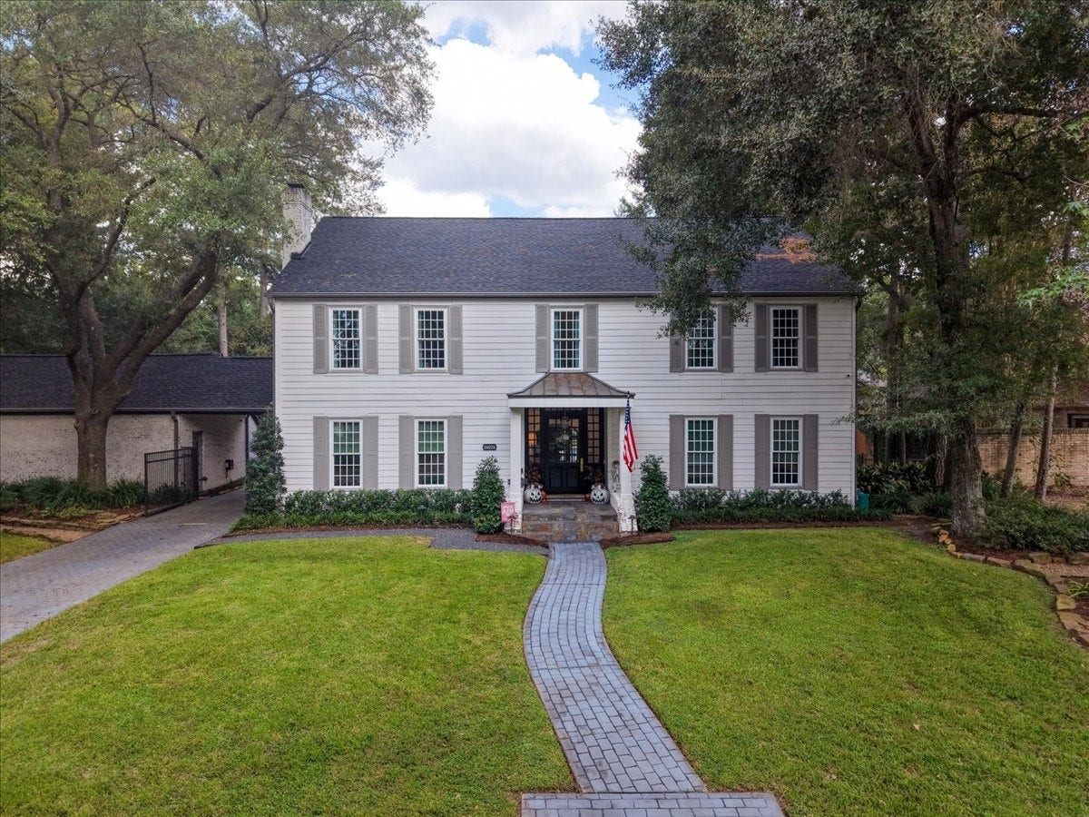 14026 Champions Hamlet Court, Houston, TX 77069 Mature oaks, a manicured lawn, and landscape lighting frame a stately entry in an exclusive, gated neighborhood, with more than $400K in upgrades already done and ready for its next owner.