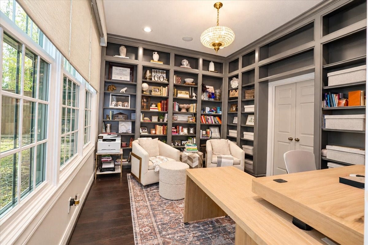 14026 Champions Hamlet Court, Houston, TX 77069 Room for every book and keepsake! Floor-to-ceiling enameled built-ins wraps this elegant study, with double doors that open directly to the primary bedroom.
