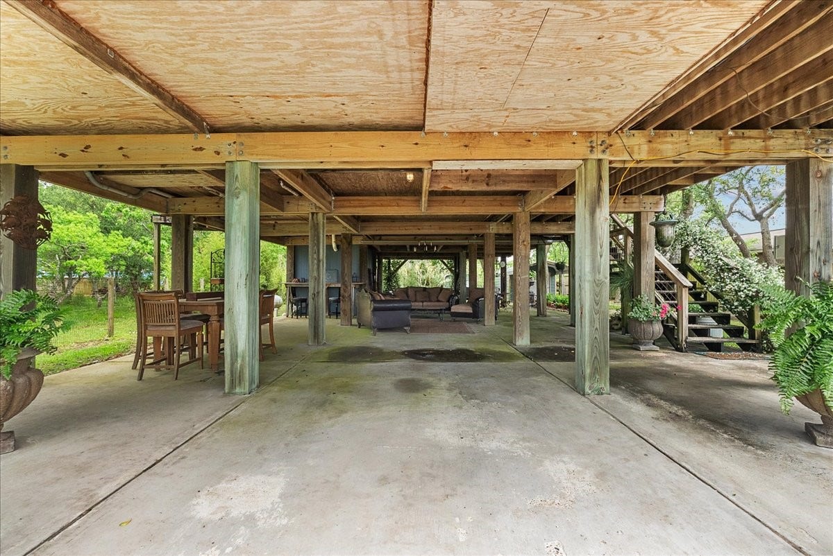 939 17th Street, Dickinson, TX 77539 Substantial covered space beneath the home with a concrete surface and plenty of flexibility for parking, entertaining or additional outdoor use