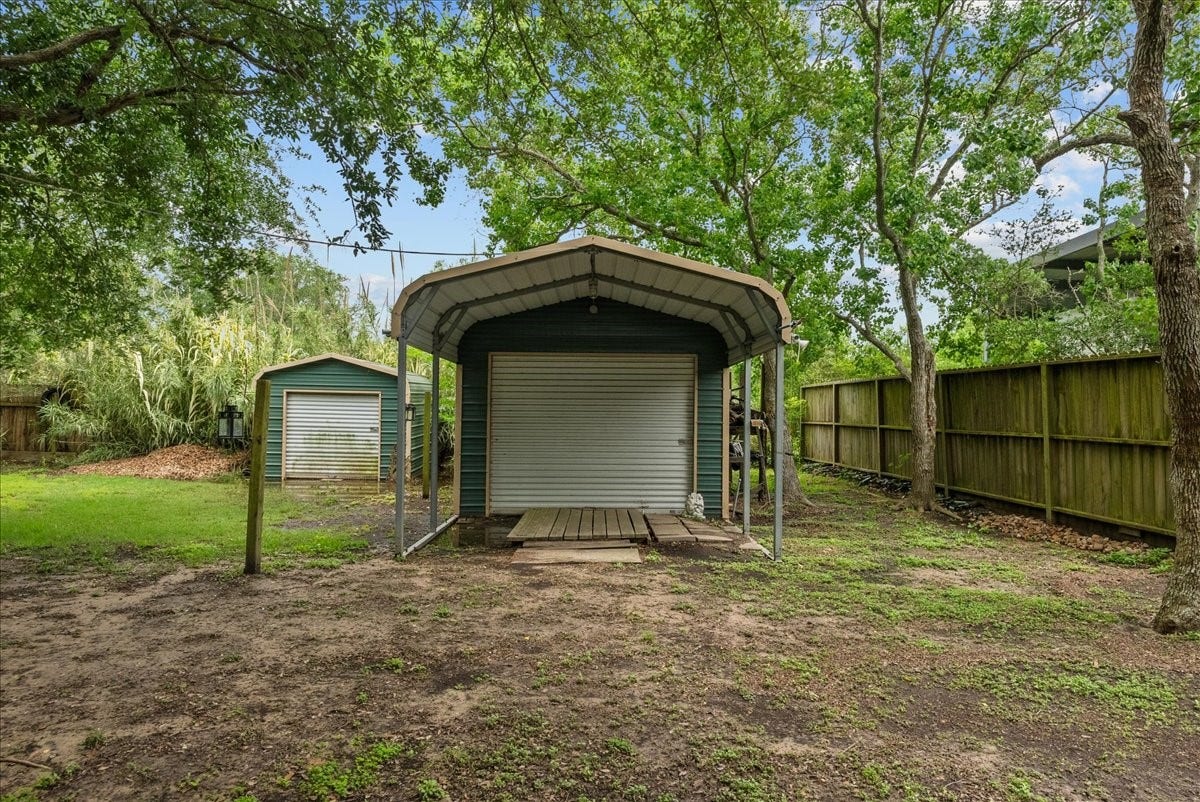 939 17th Street, Dickinson, TX 77539 Detached storage buildings provide valuable additional space for lawn equipment, recreational gear or workshop use