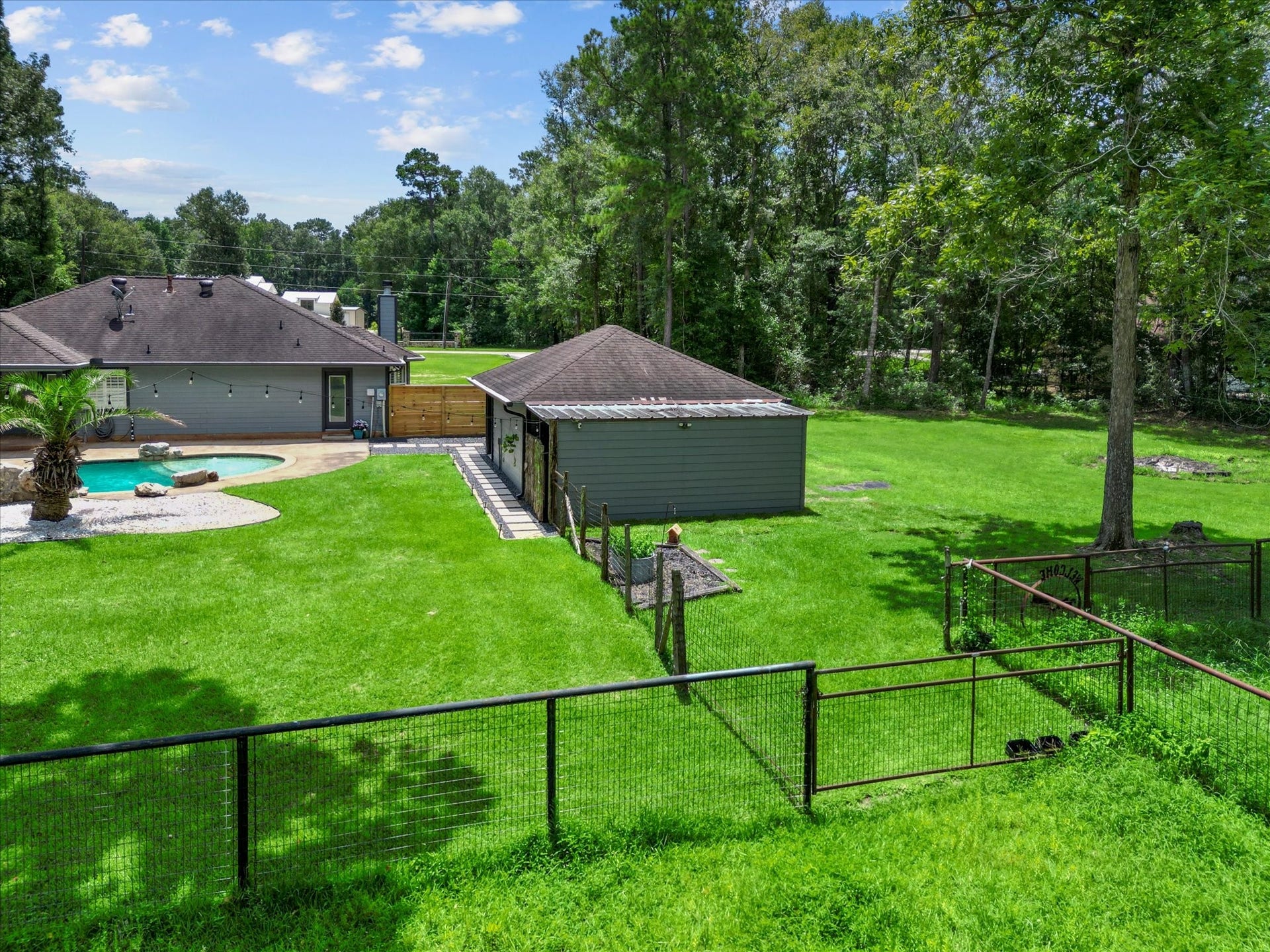 23963 Majestic Forest, New Caney, TX 77357 view of property from pastire