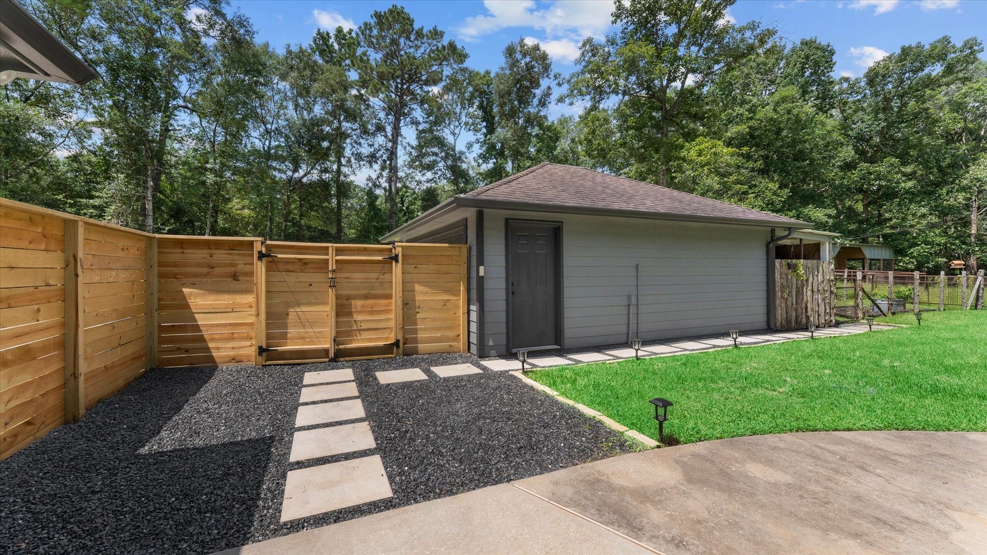 23963 Majestic Forest, New Caney, TX 77357 Backyard from laundry room back door