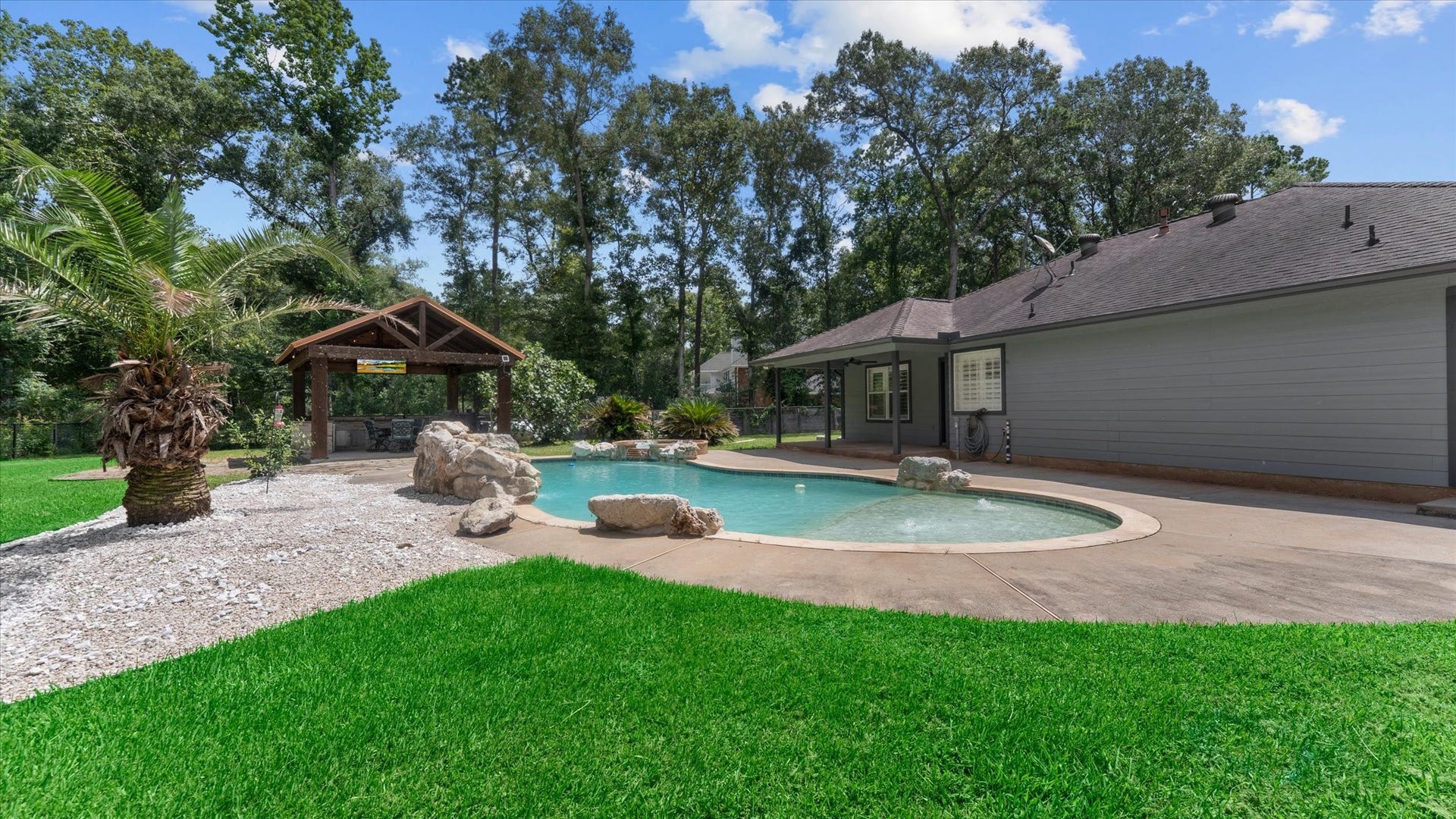 23963 Majestic Forest, New Caney, TX 77357 Pool Oasis from garage side