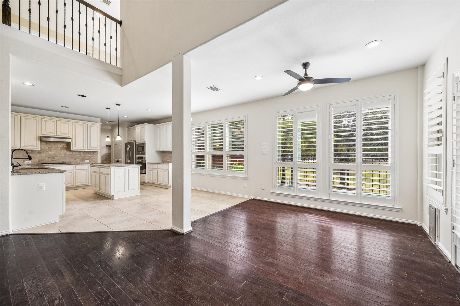 Thoughtful craftsmanship and cohesive finishes help this enclosed addition blend seamlessly with the home's original design, creating a natural extension of the living space near the back door.