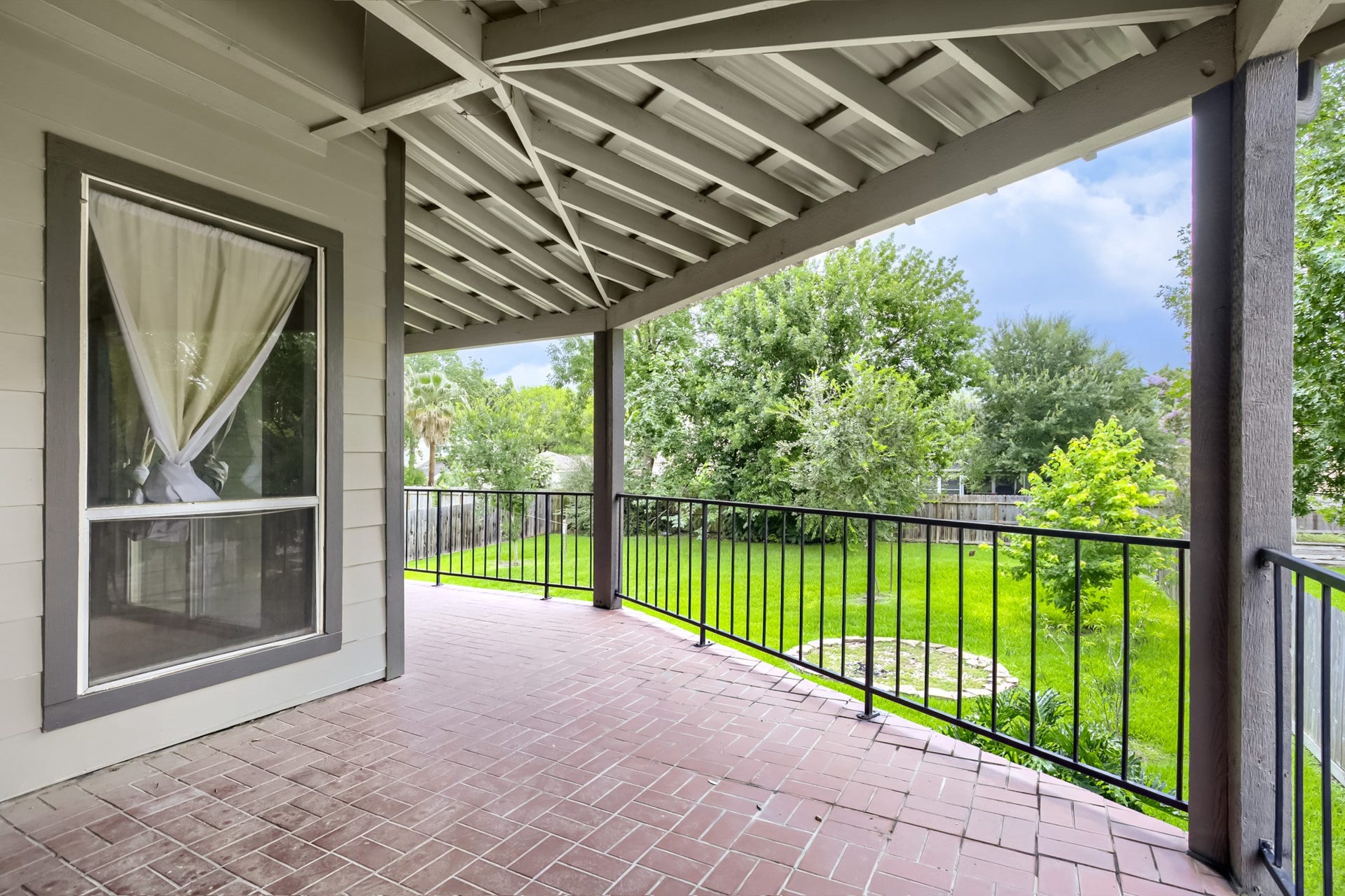 16505 Cornwall Street, Jersey Village, TX 77040 View of the upstairs balcony overlooking the backyard.